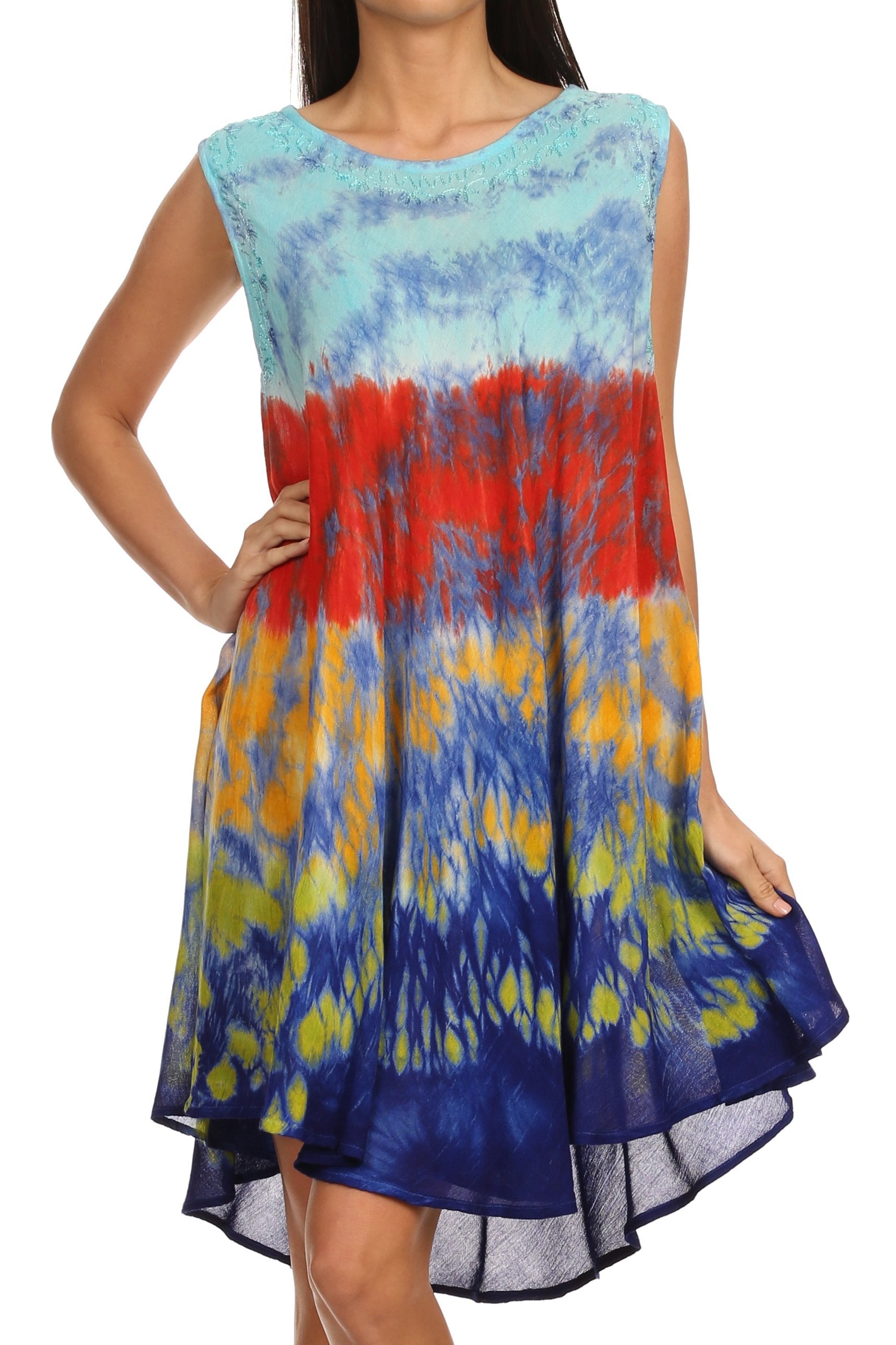 Woman wearing a colorful tie-dye dress with a white background