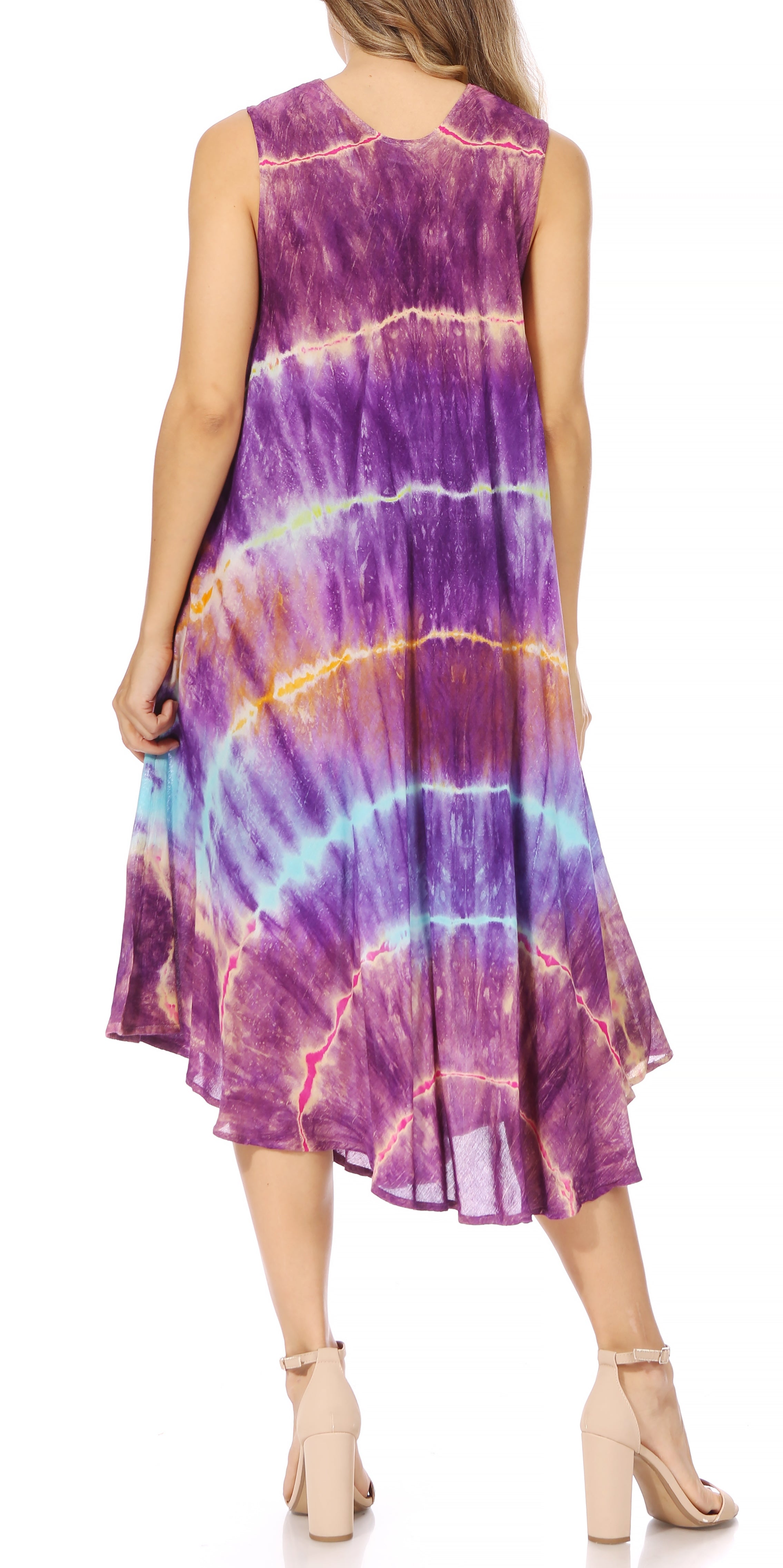 Woman wearing a sleeveless tie-dye dress with a white background