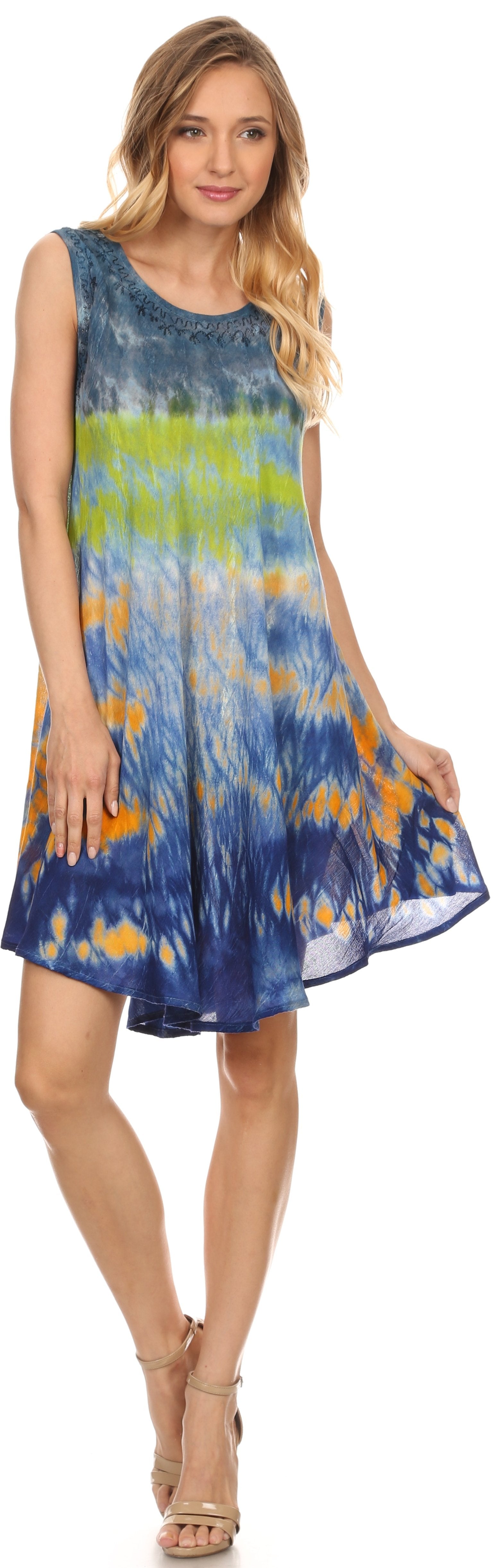 Woman wearing a colorful tie-dye dress on a white background