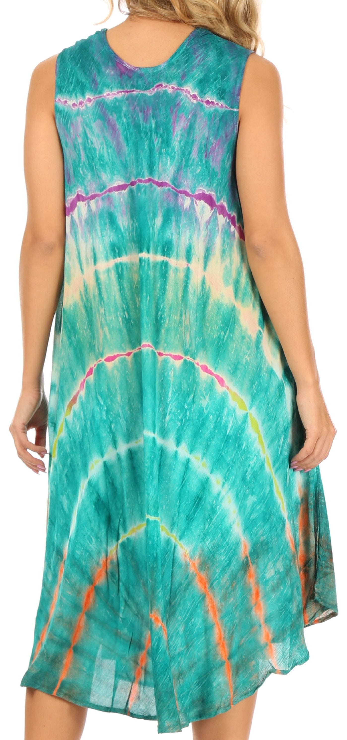 Person wearing a tie-dye dress with a colorful pattern on a white background