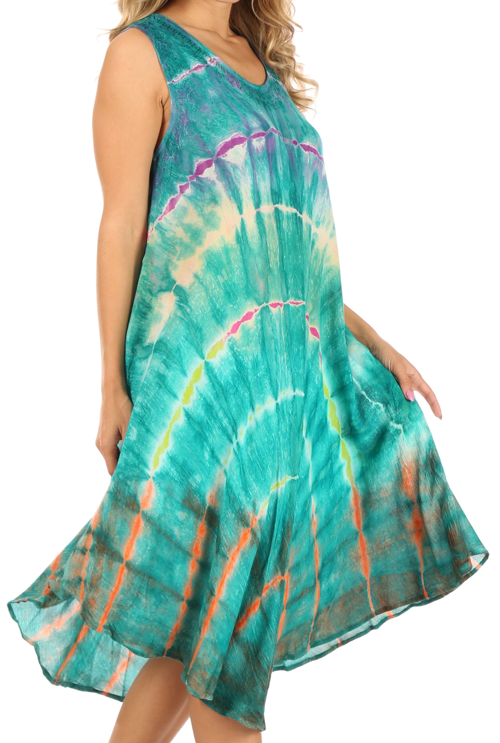 Woman wearing a tie-dye dress with a white background