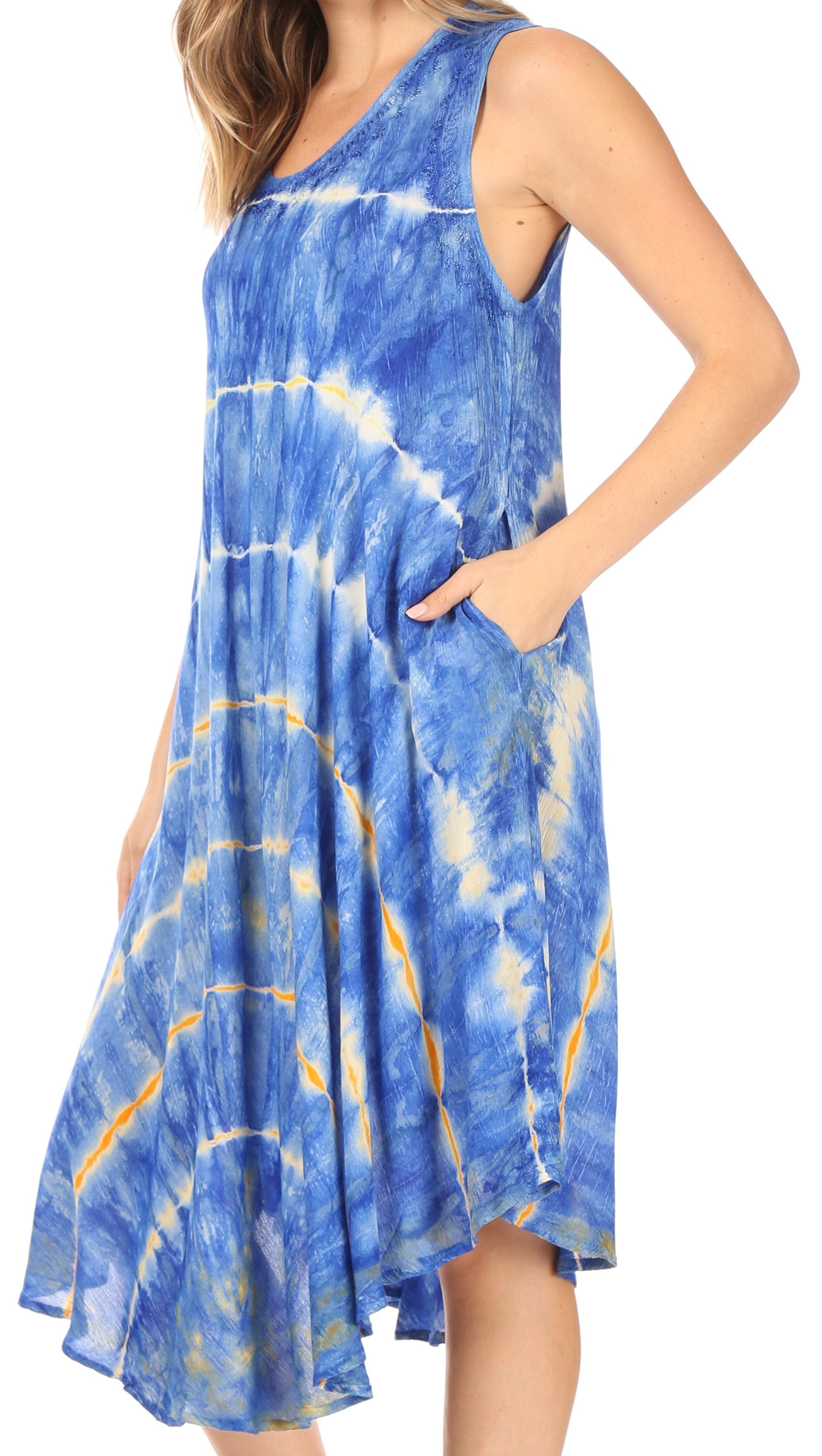 Blue tie-dye dress worn by a person on a white background