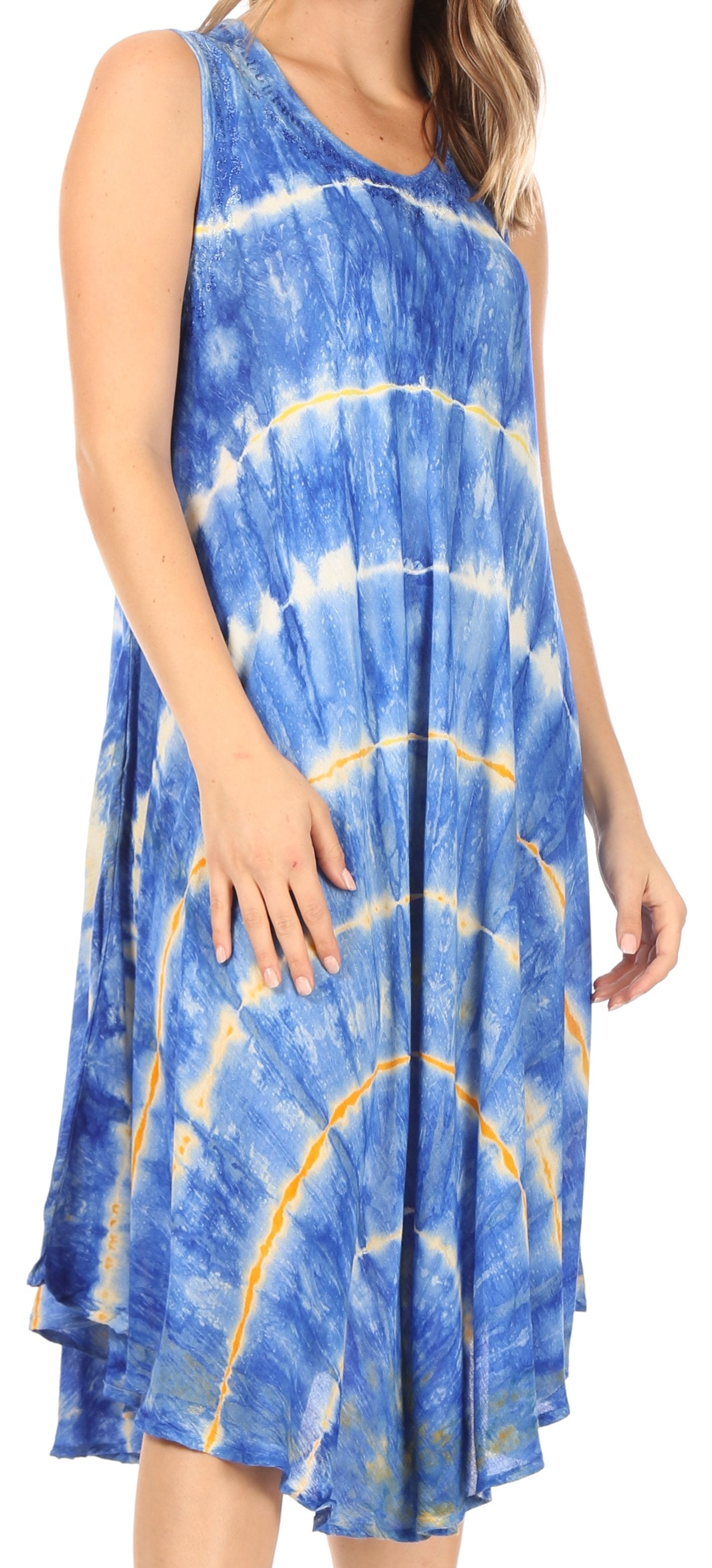 Woman wearing a blue and yellow tie-dye dress.