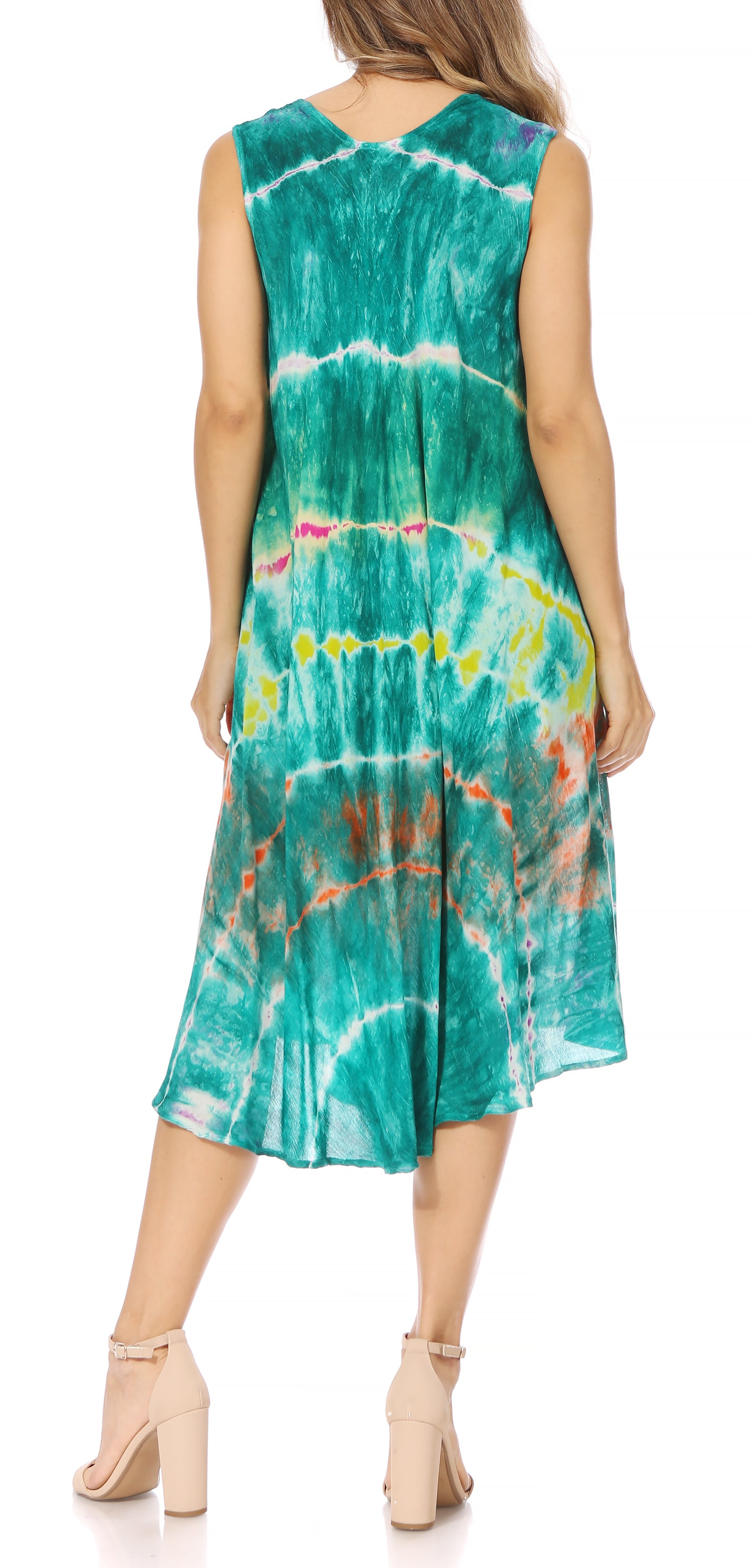 Woman wearing a tie-dye dress with a white background