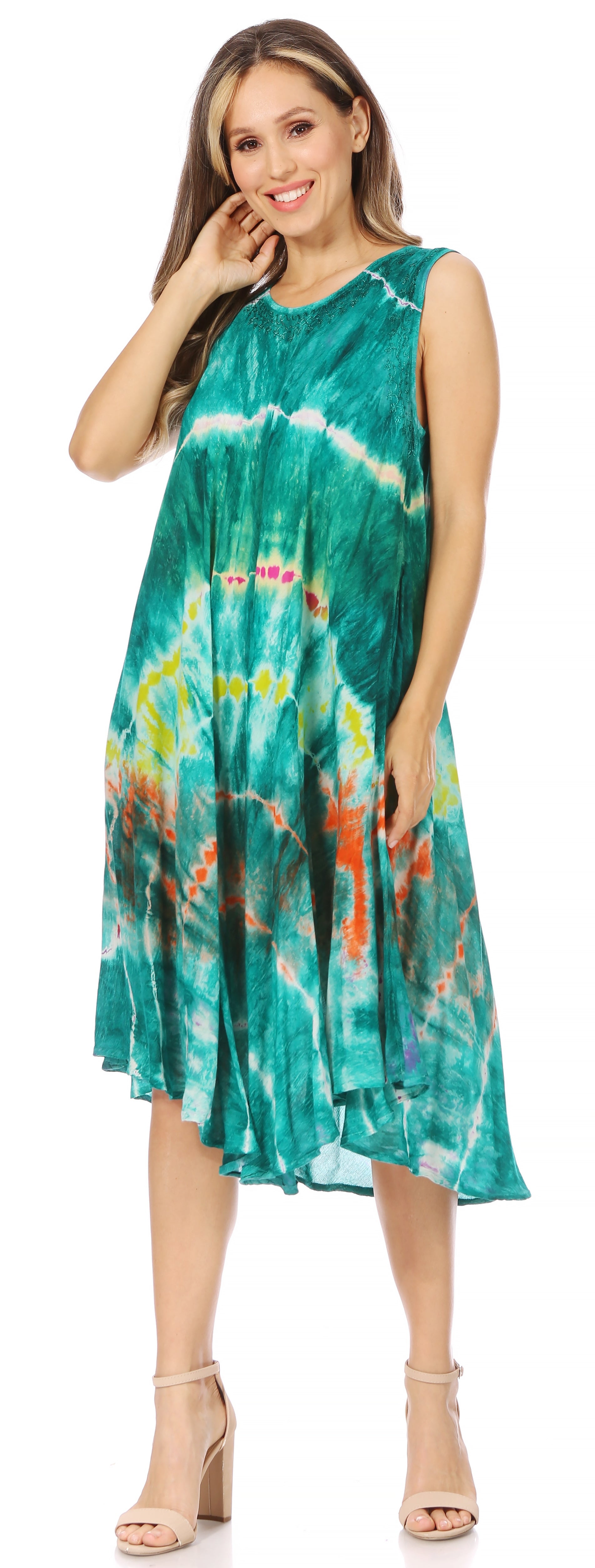 Woman wearing a tie-dye dress with a white background