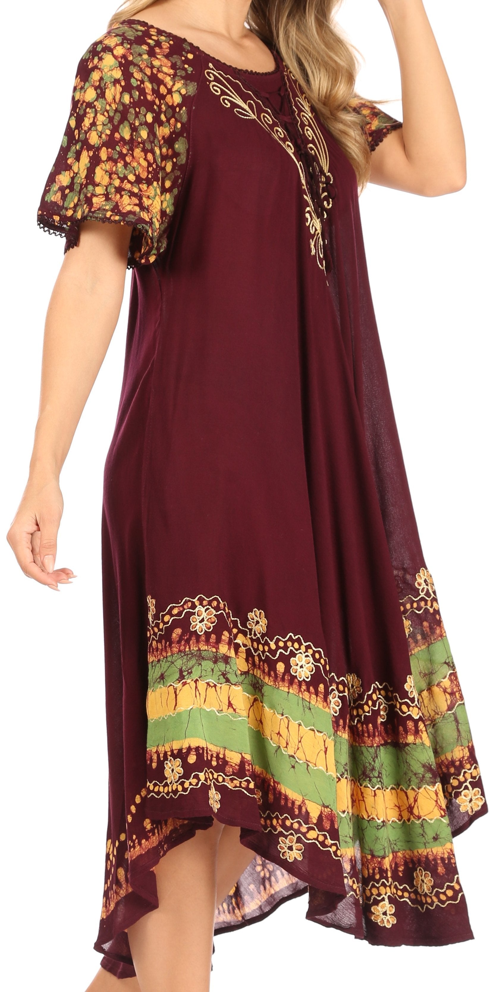 Maroon dress with colorful patterned sleeves and hem on a white background
