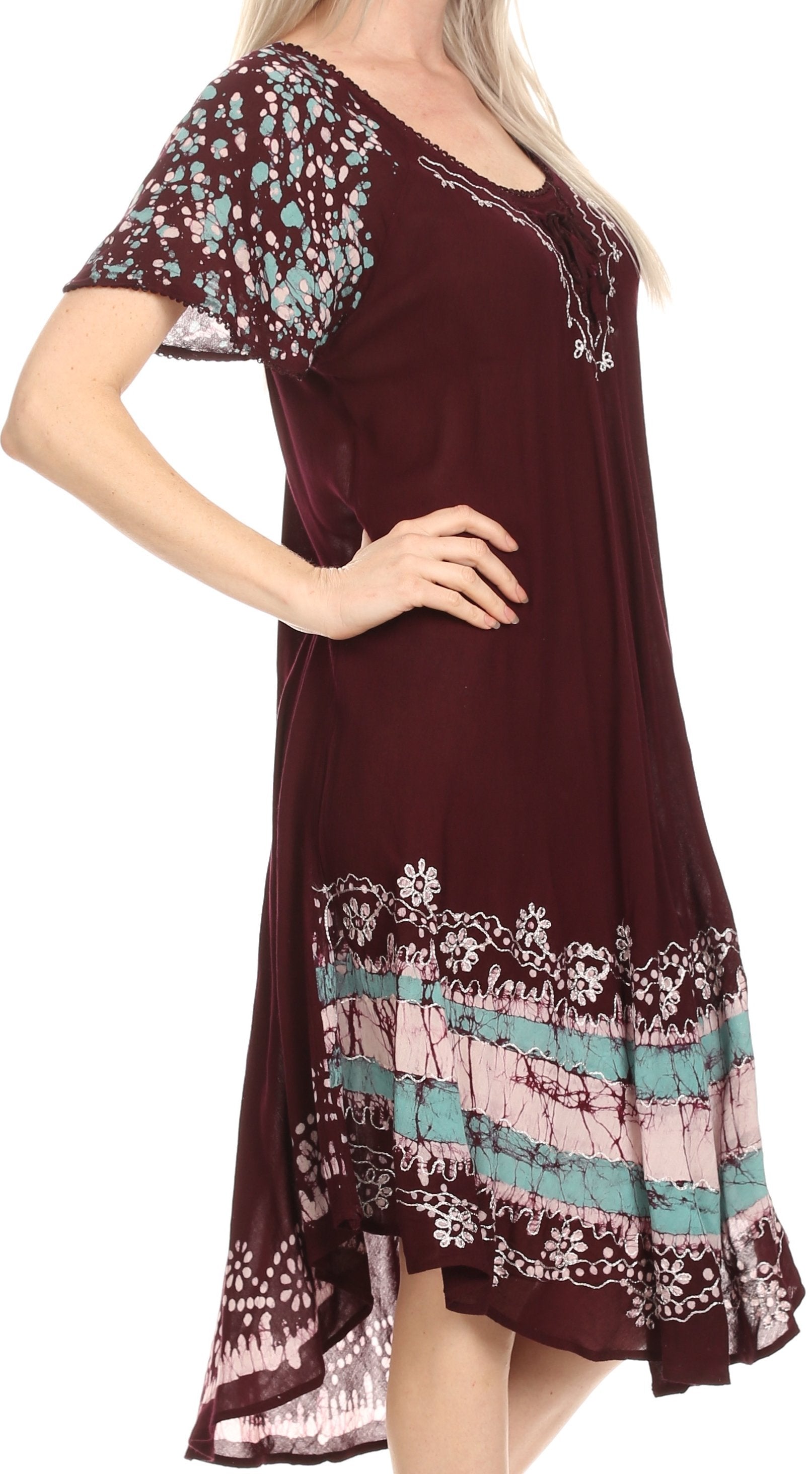 Maroon dress with floral patterns on a white background
