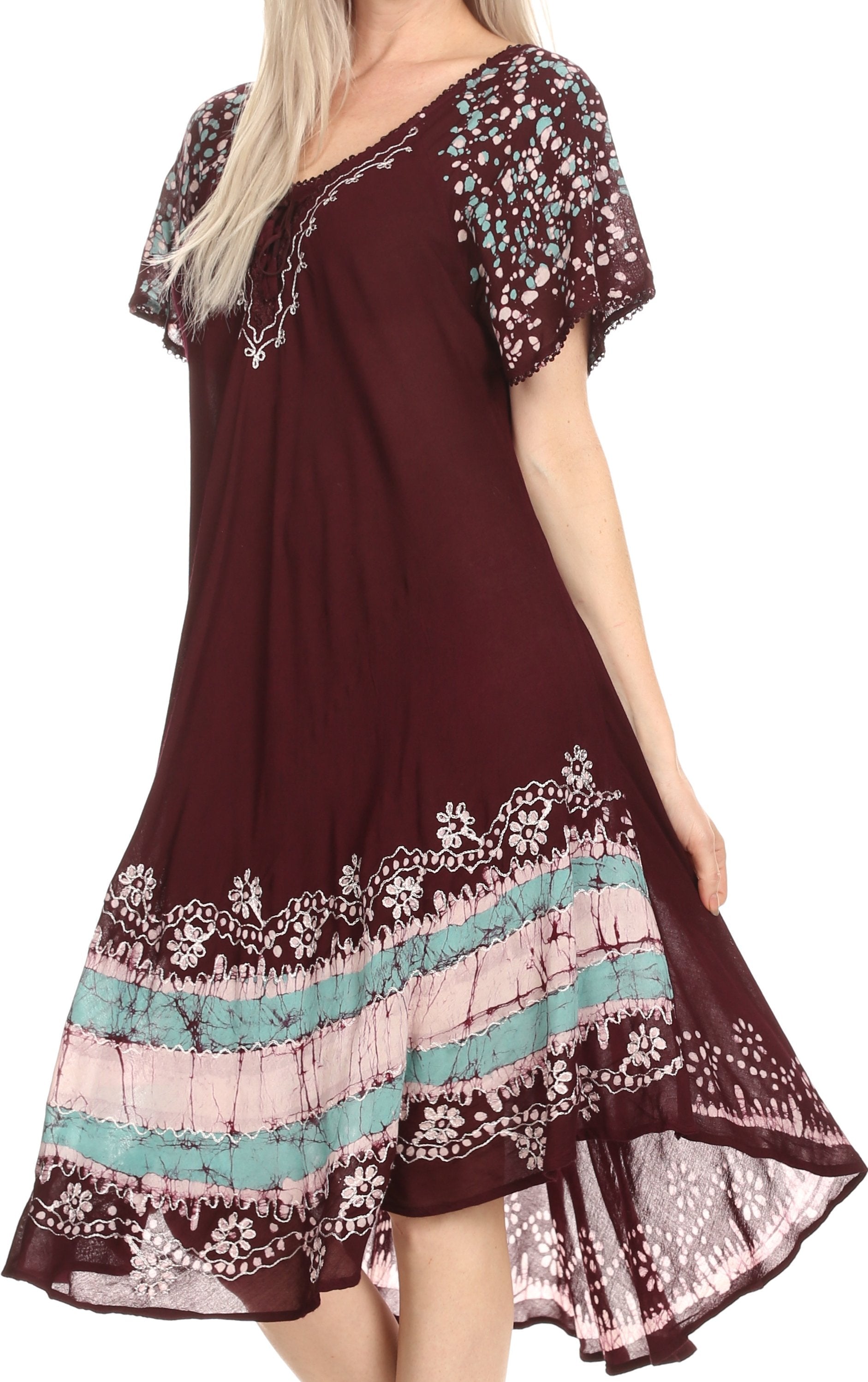 Brown dress with floral embroidery on a white background