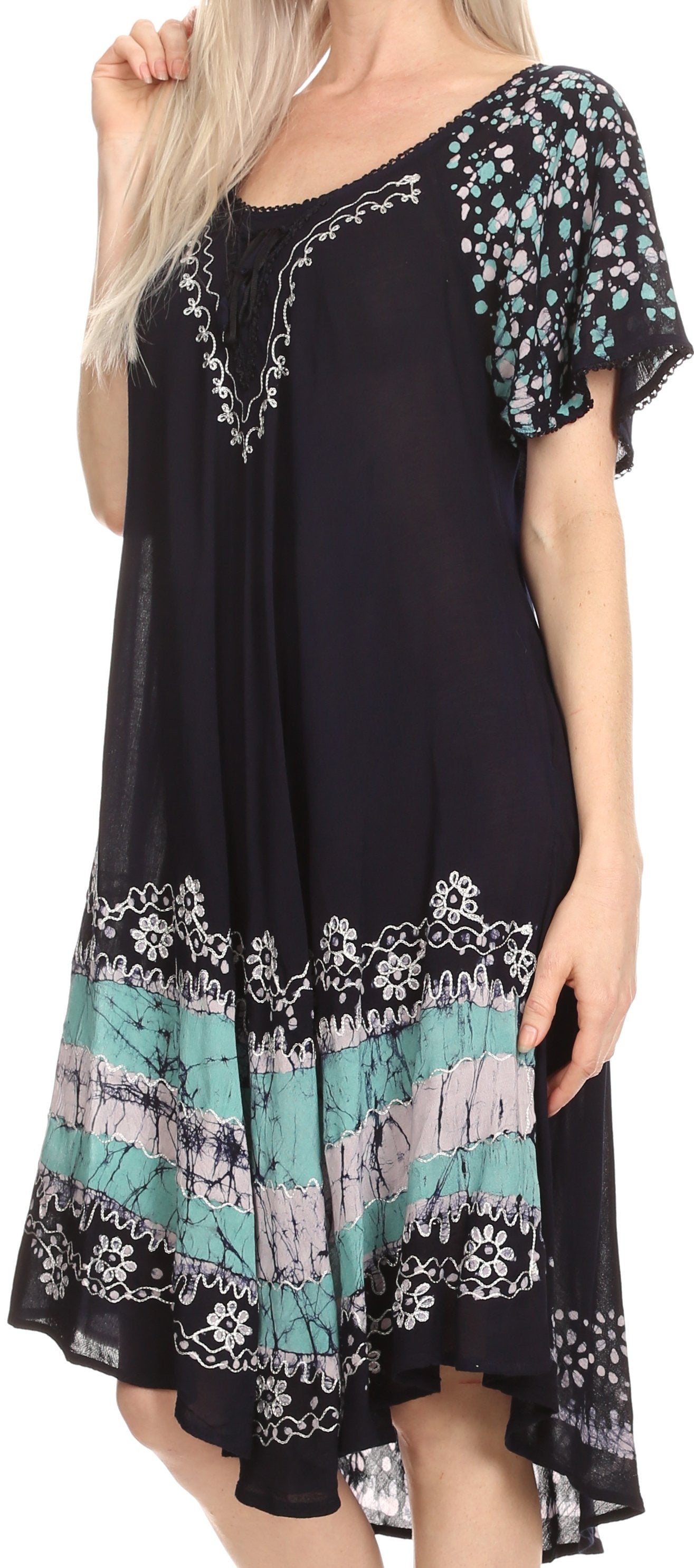 Black dress with floral patterns and embroidery on a plain background
