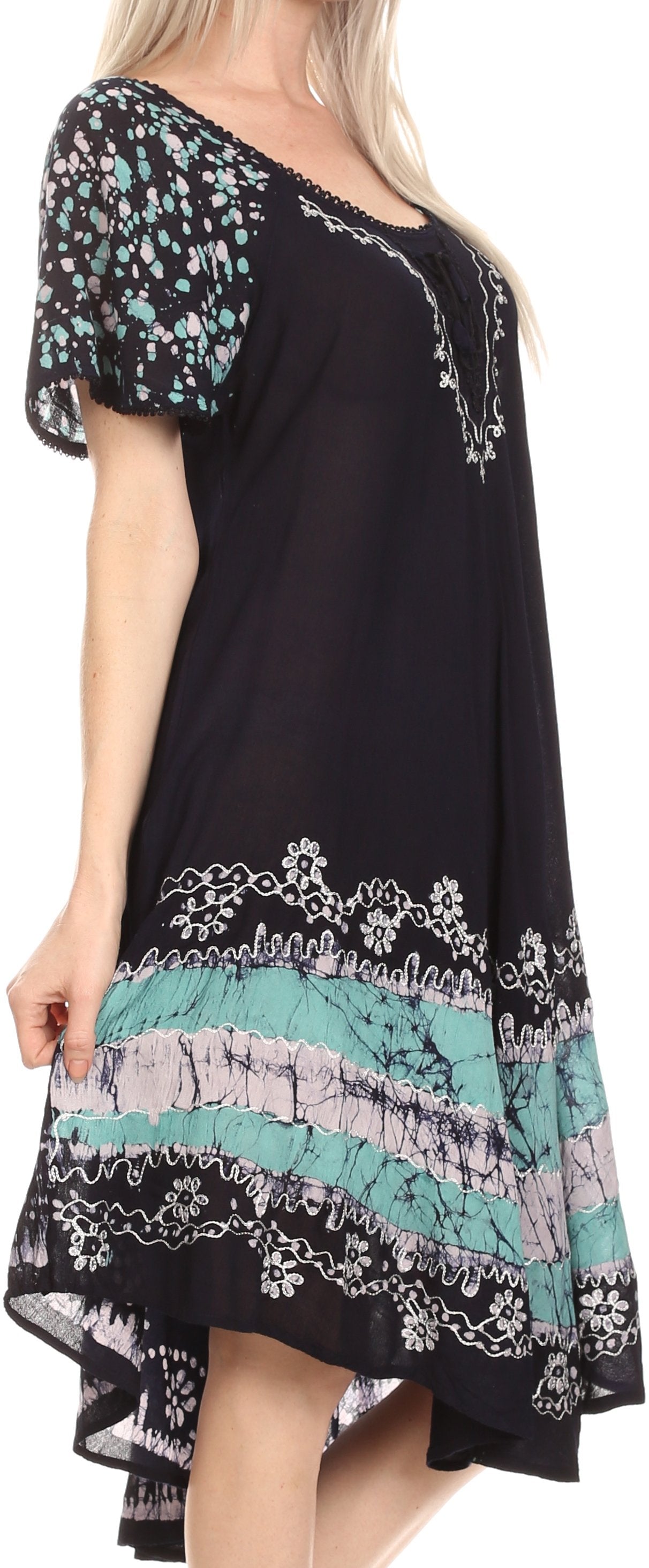 Black dress with colorful floral patterns on a plain background
