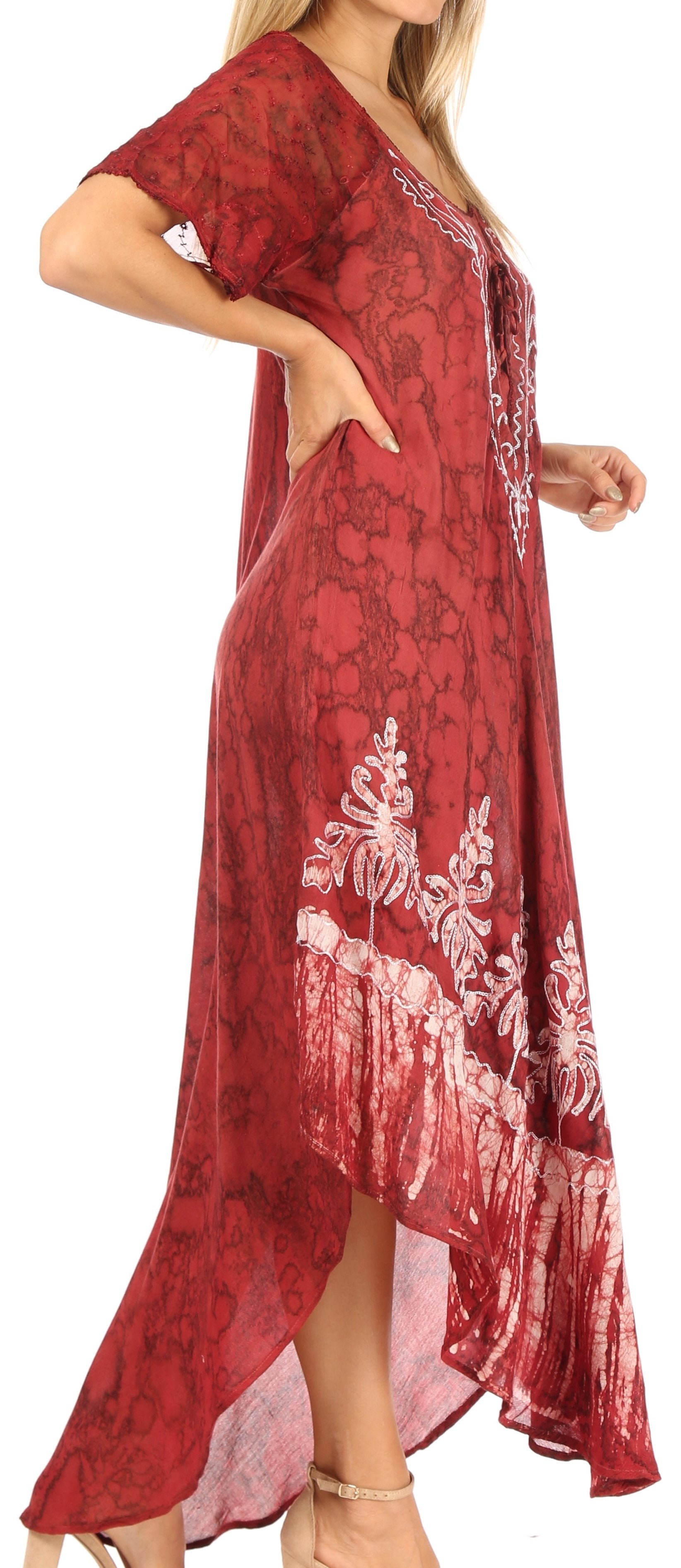 Red floral patterned dress with a high-low hem on a white background