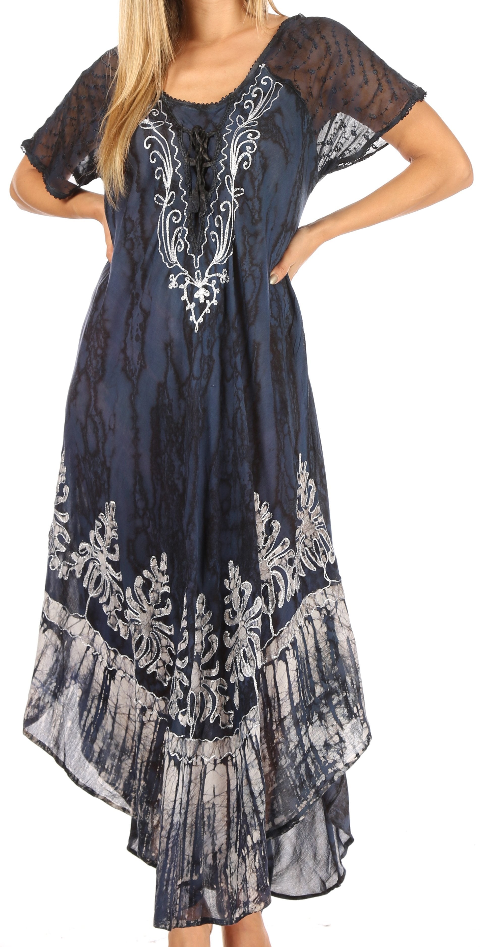 Navy blue dress with white lace details on a white background