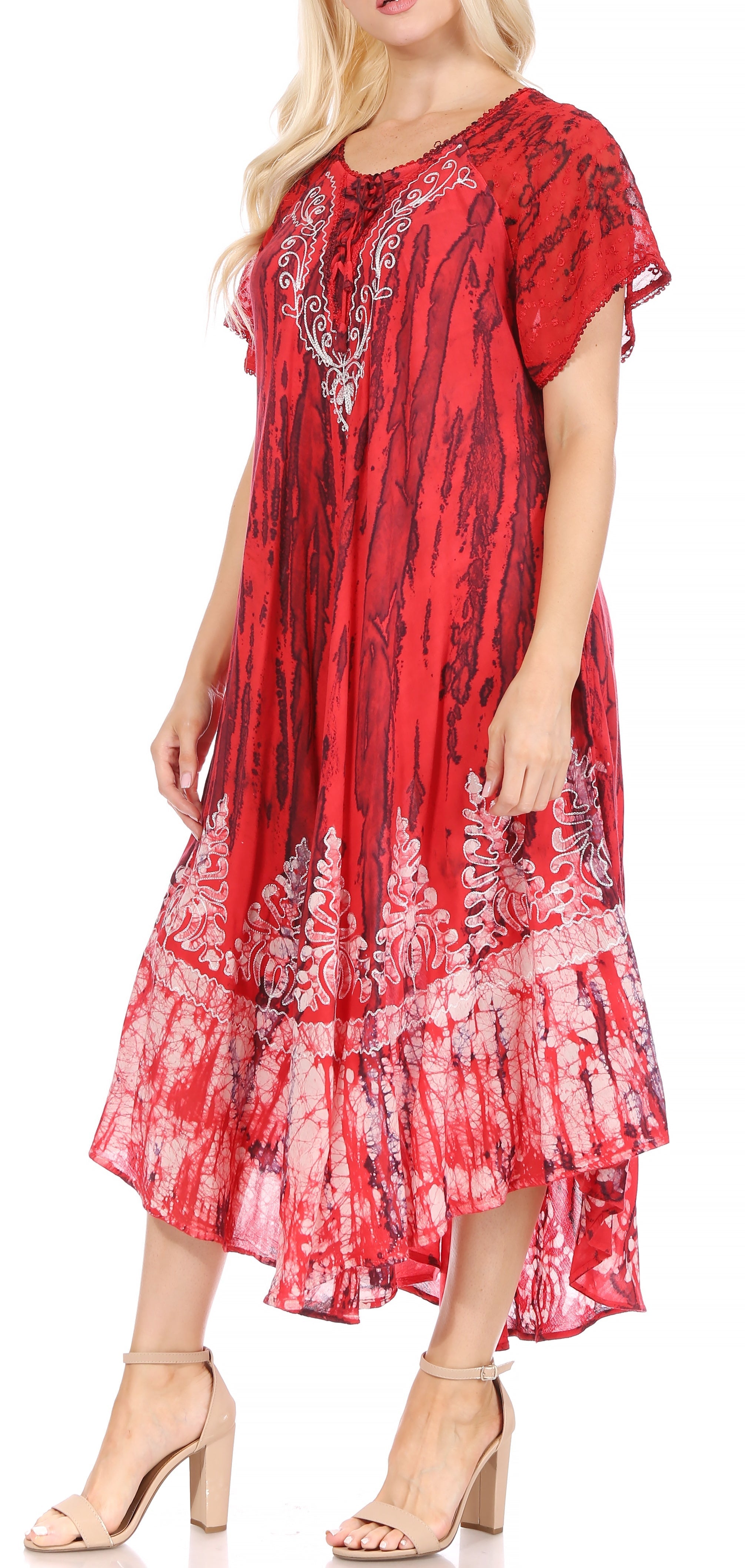 Red patterned dress worn by a model on a white background