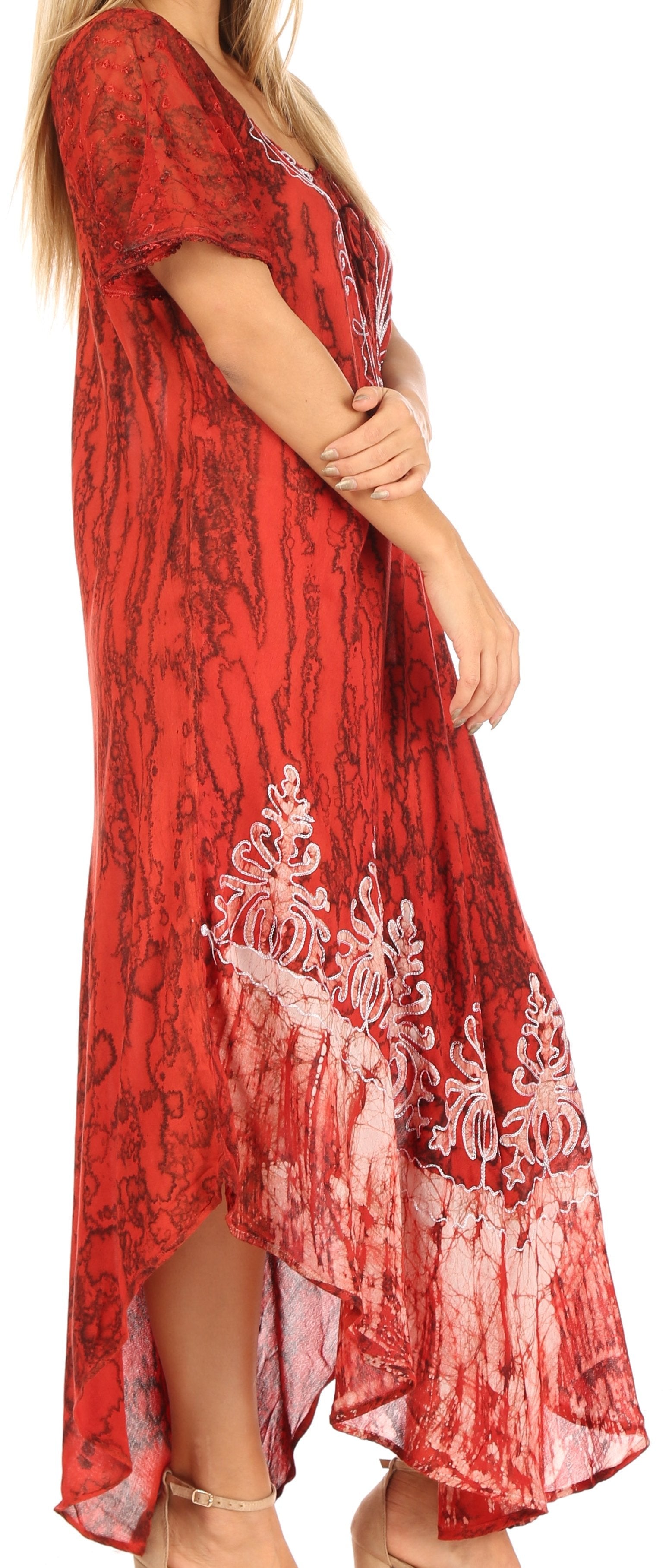 Red patterned dress with white embroidery on a white background