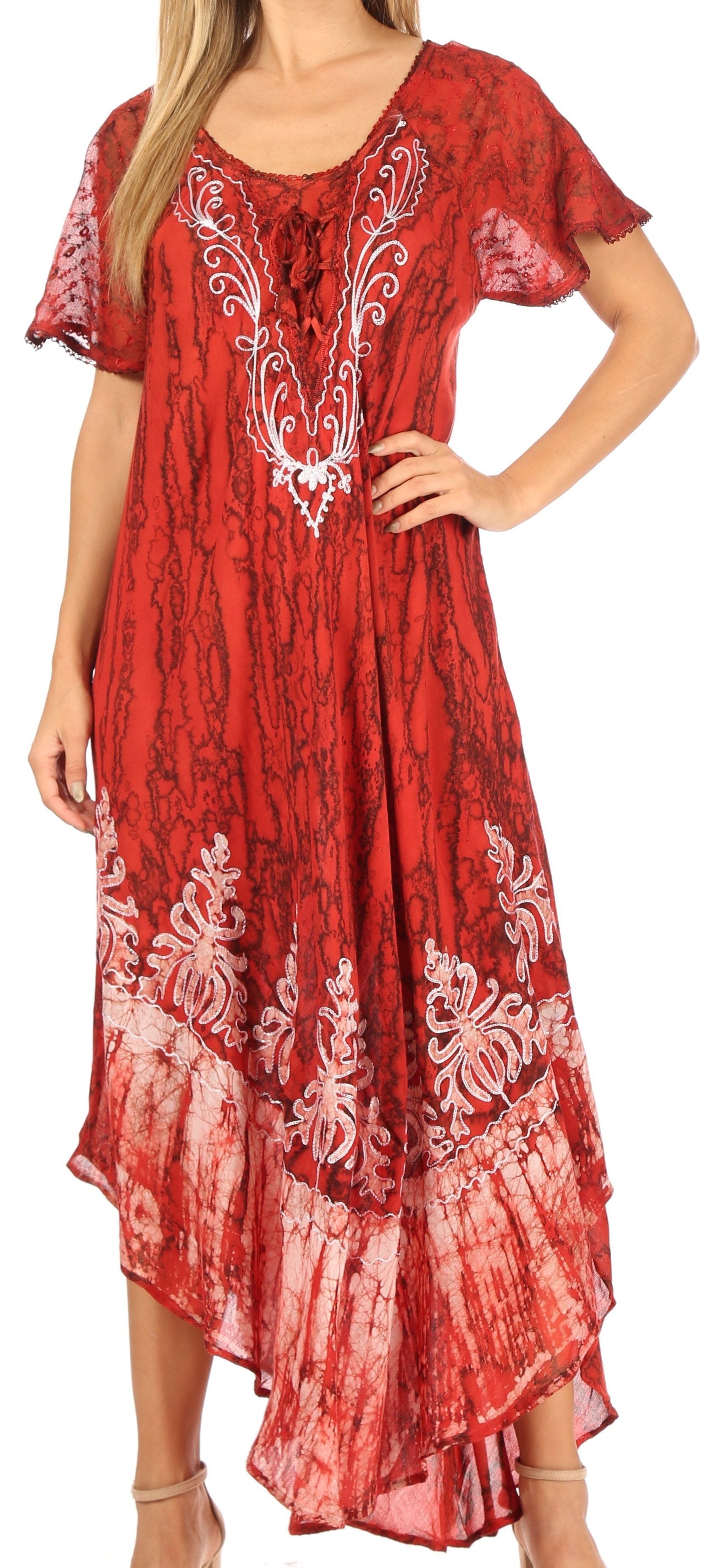 Red dress with white floral patterns worn by a person on a plain background