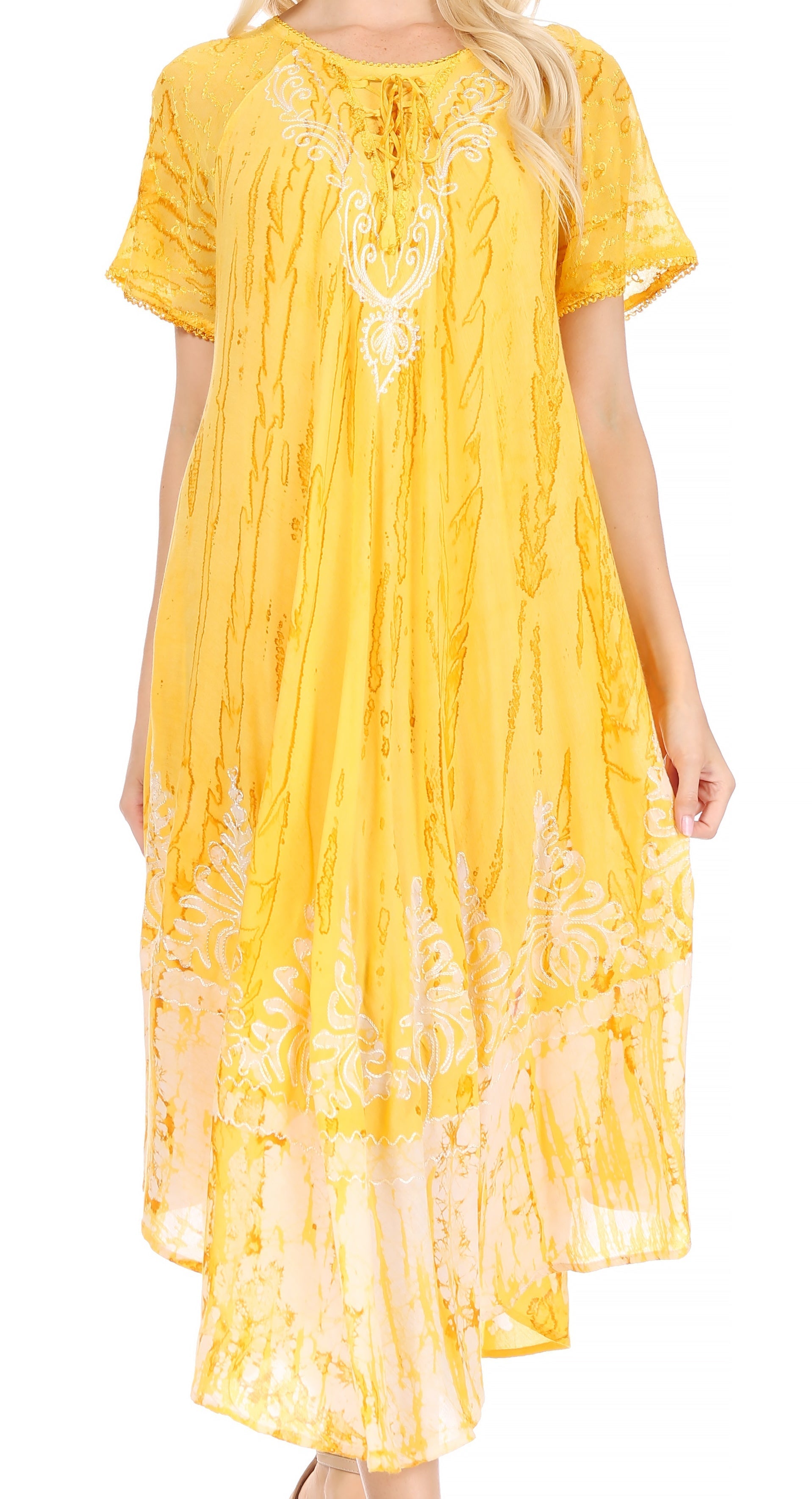 Yellow dress with embroidery on a white background