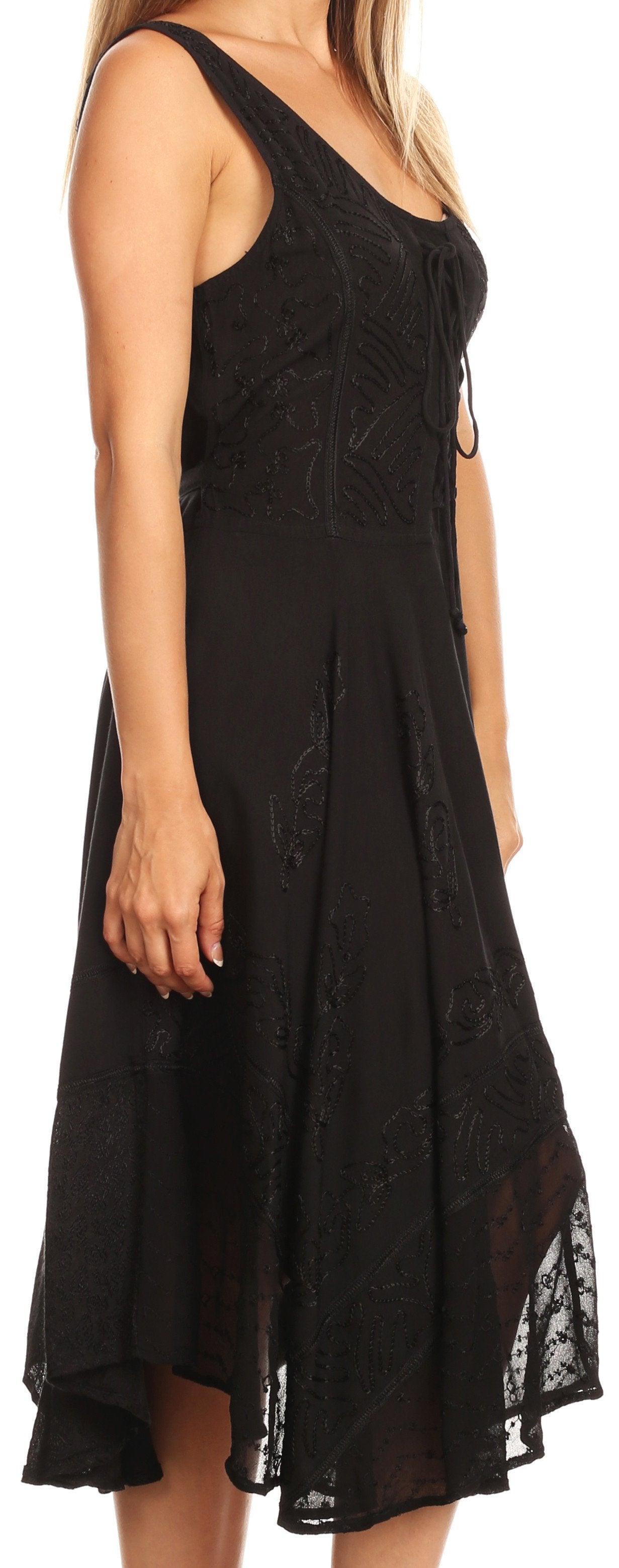 Black dress with lace details on a white background