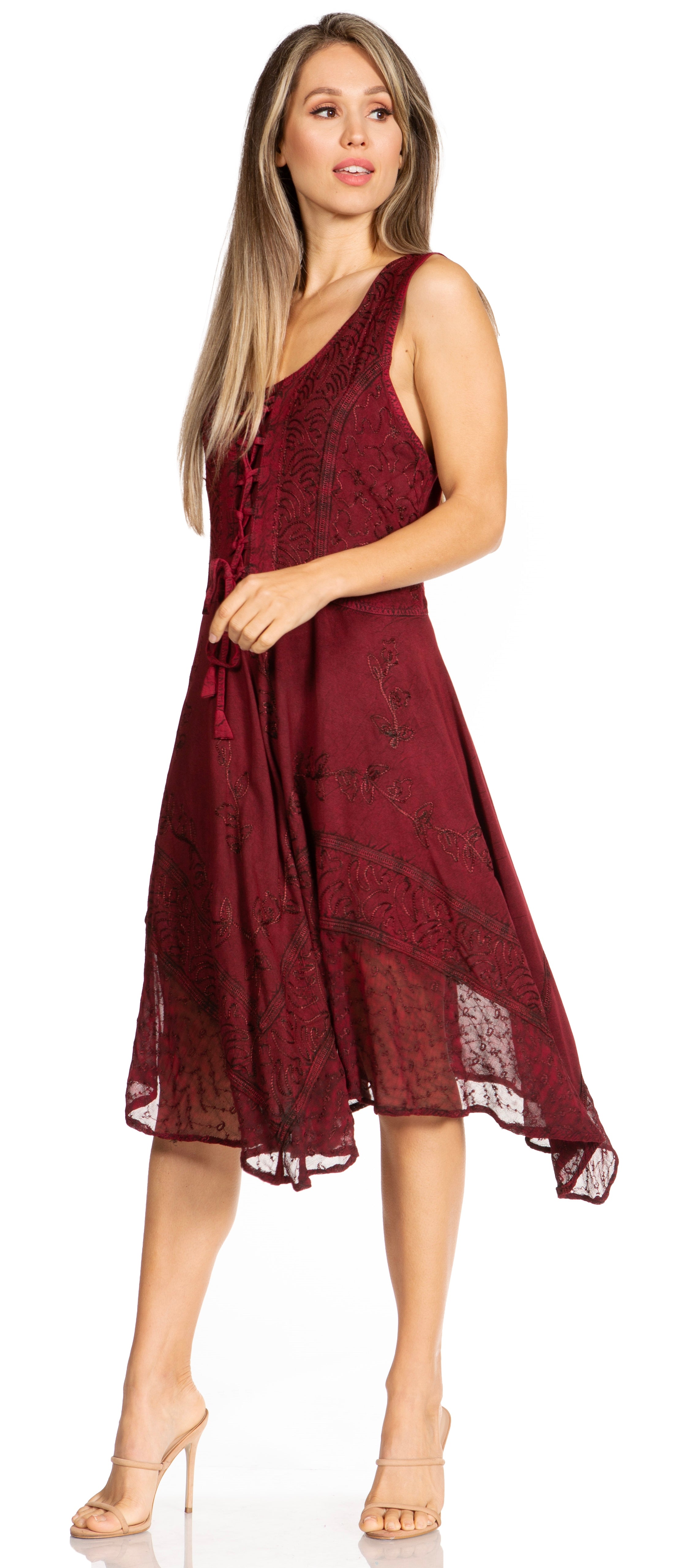 Woman wearing a burgundy lace dress on a white background