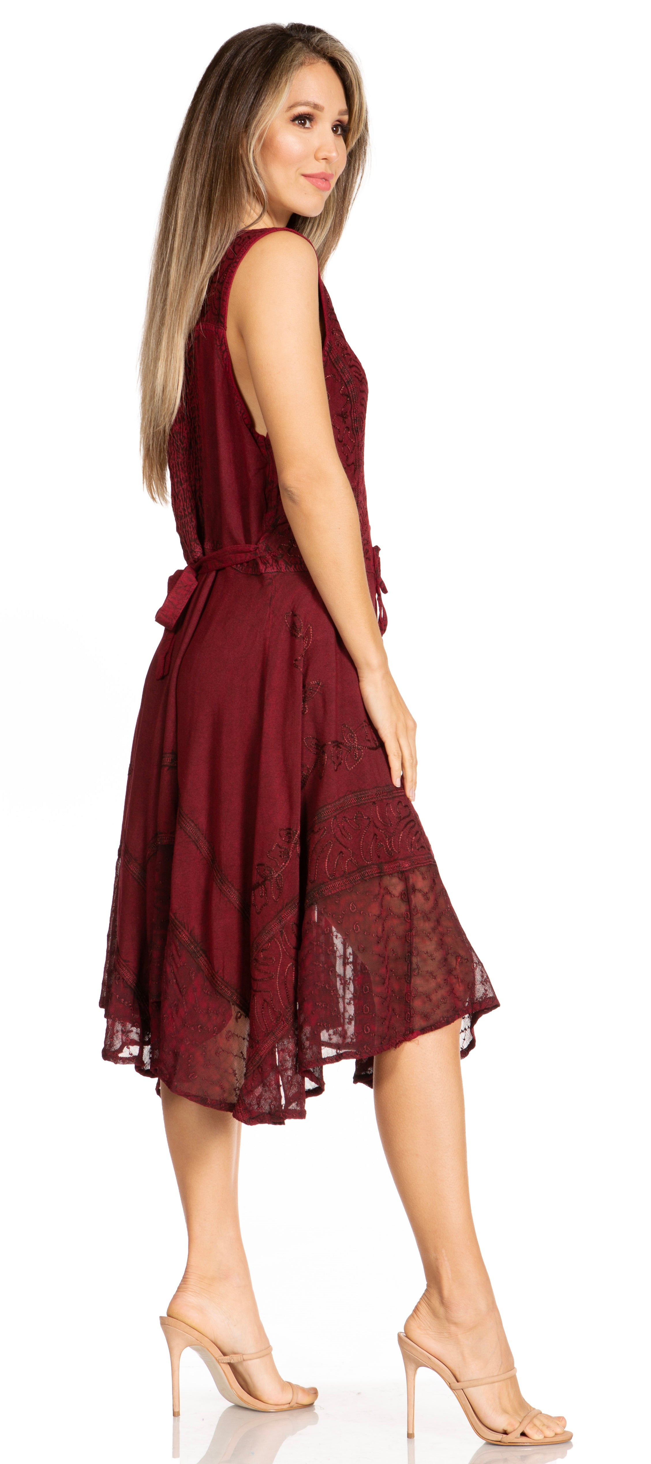 Woman wearing a burgundy dress on a white background