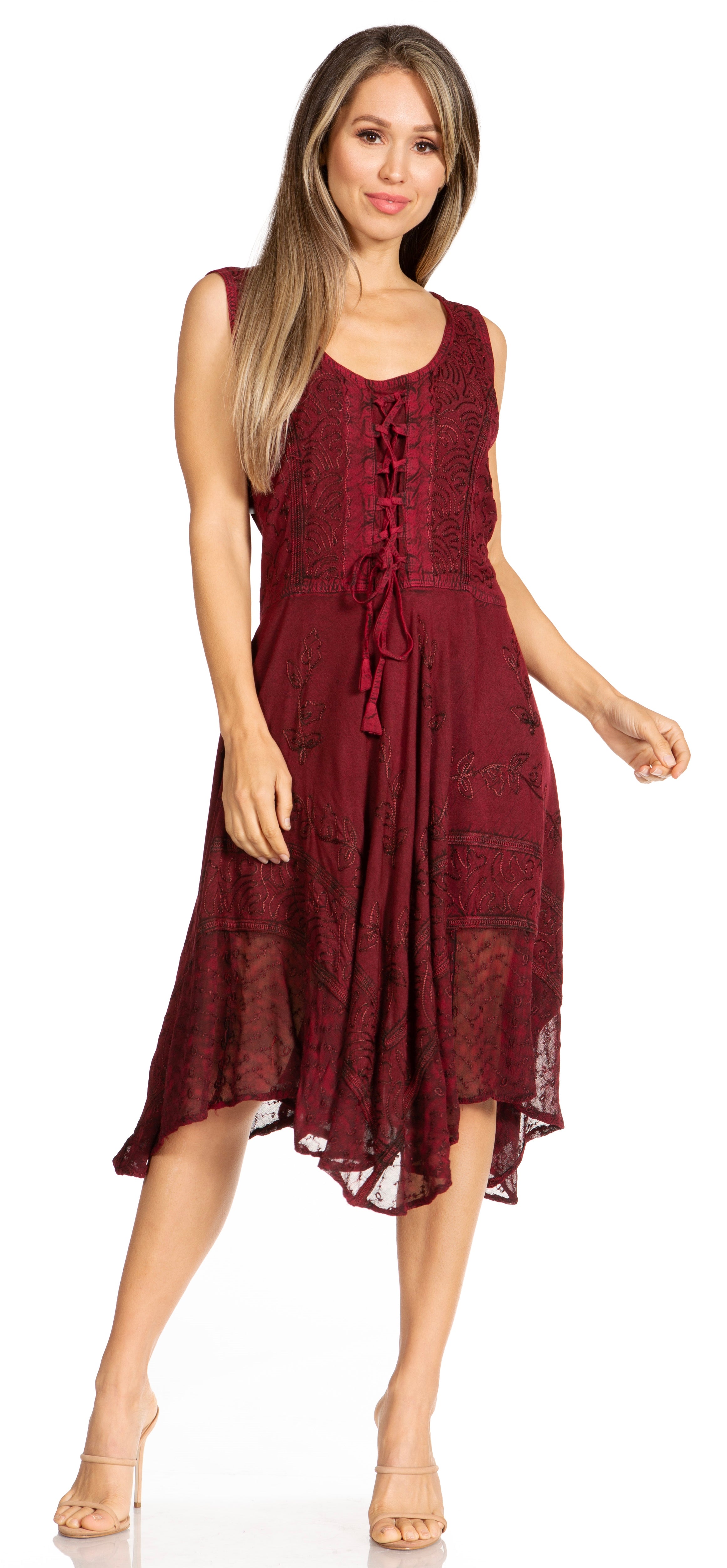 Woman wearing a burgundy lace dress on a white background