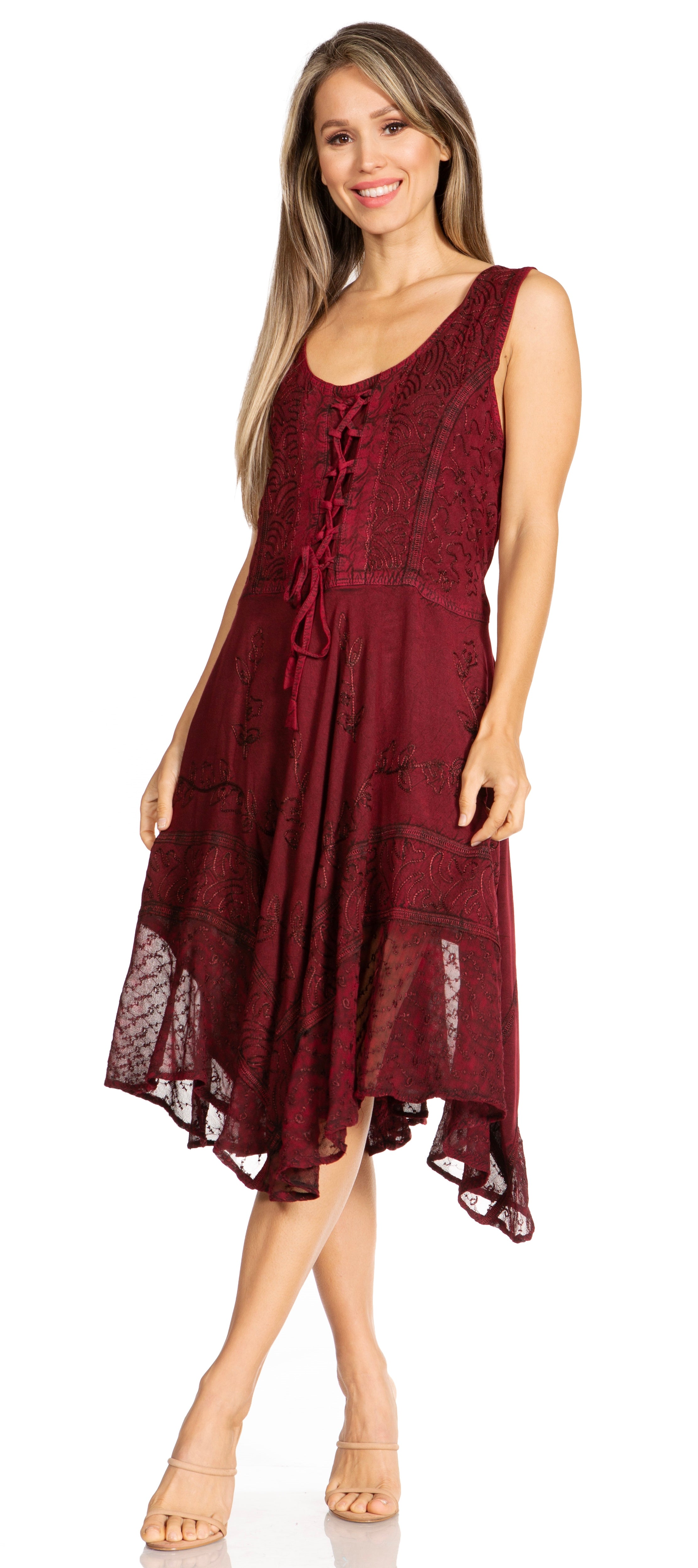 Woman wearing a burgundy dress with lace details on a white background