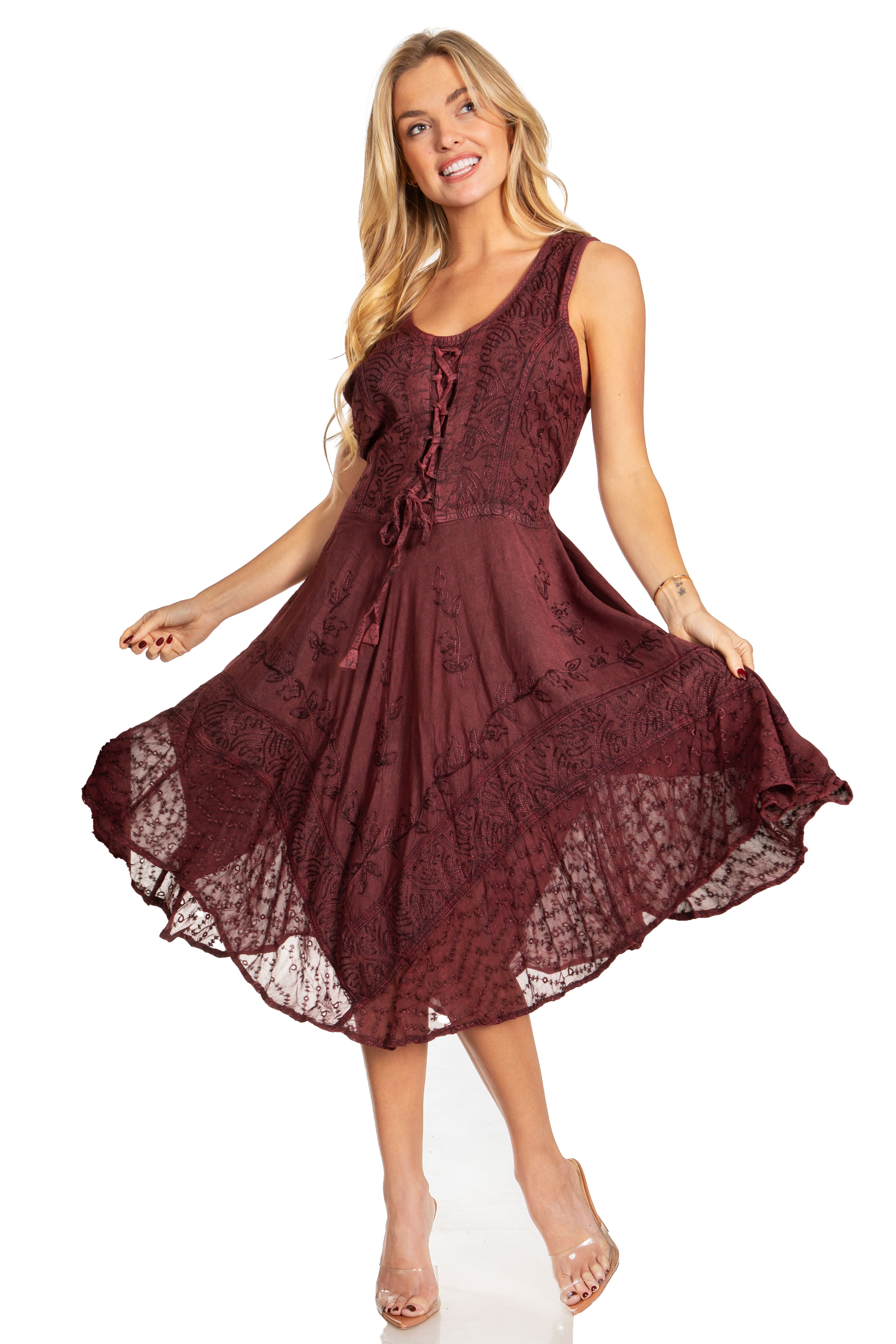 Woman wearing a burgundy lace dress on a white background