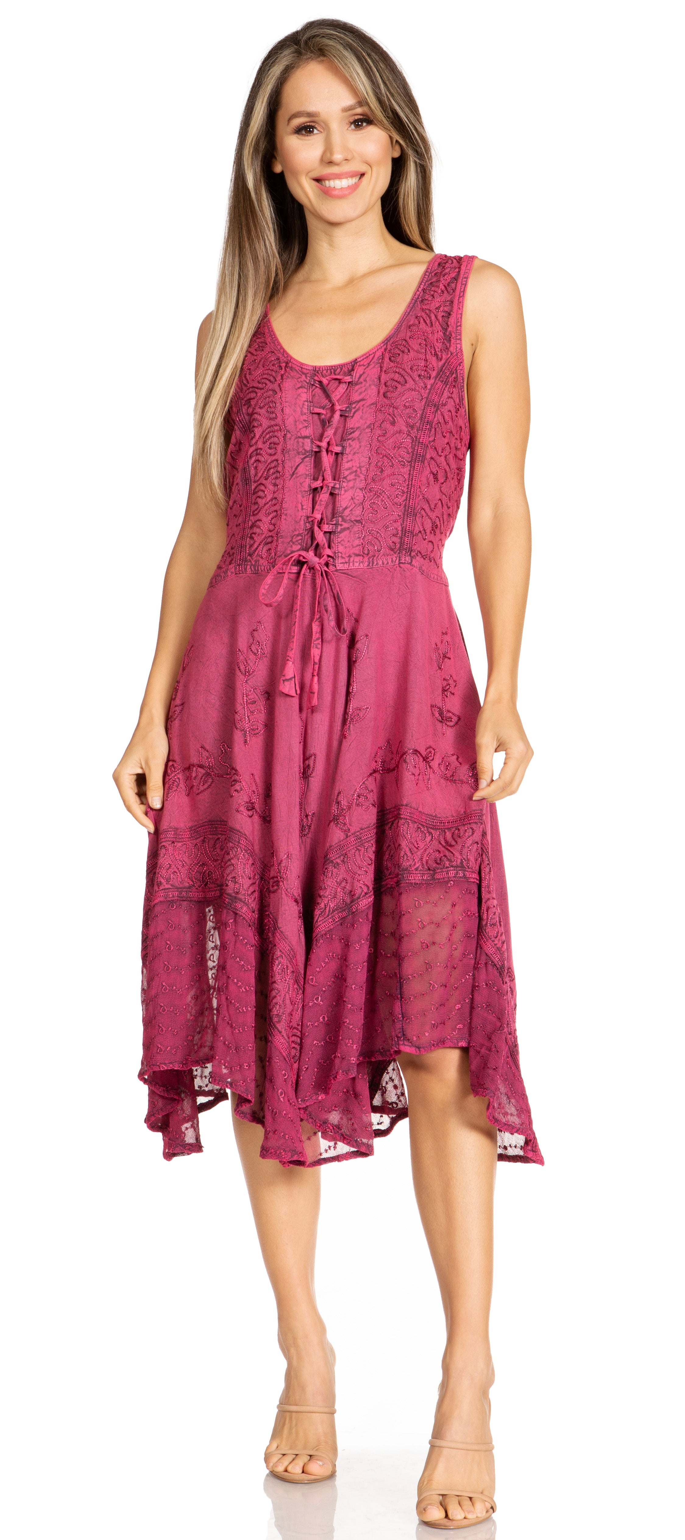 Woman wearing a pink patterned dress on a white background