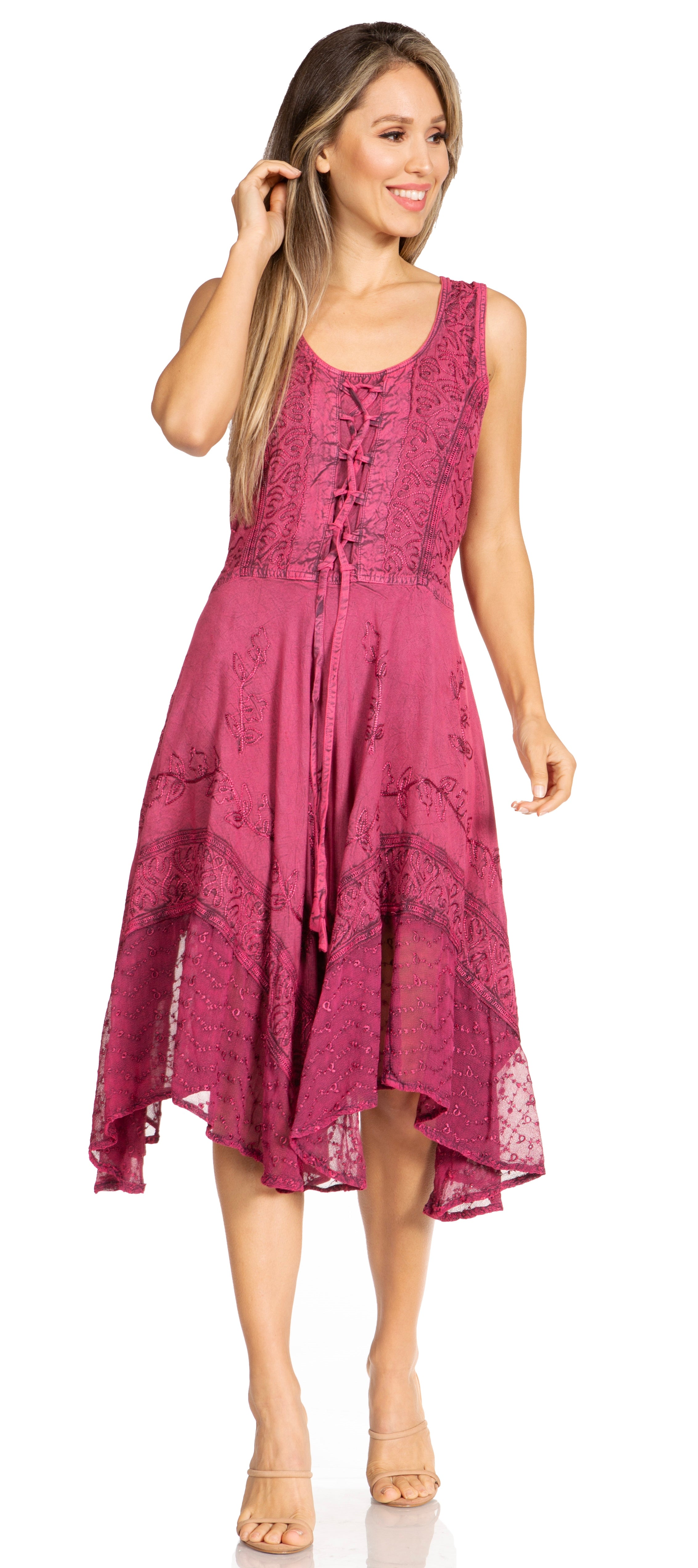 Woman wearing a pink lace dress on a white background