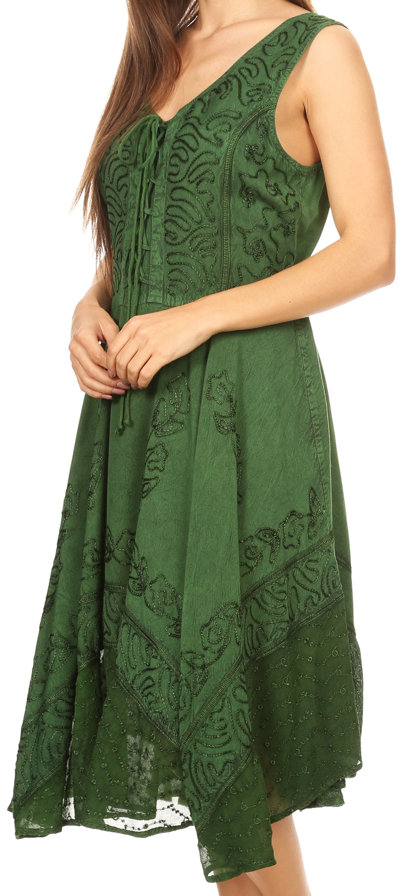 Green lace dress worn by a model on a white background