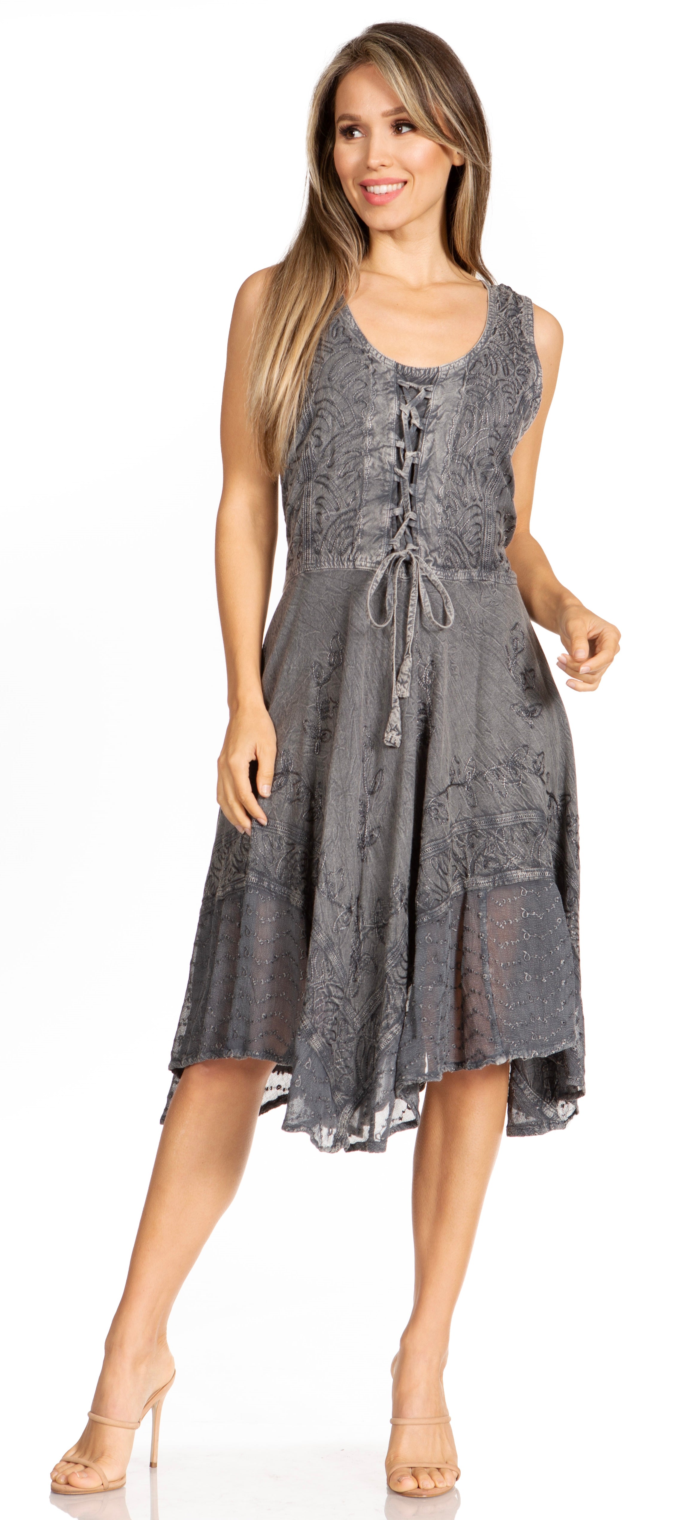 Woman wearing a gray lace dress on a white background