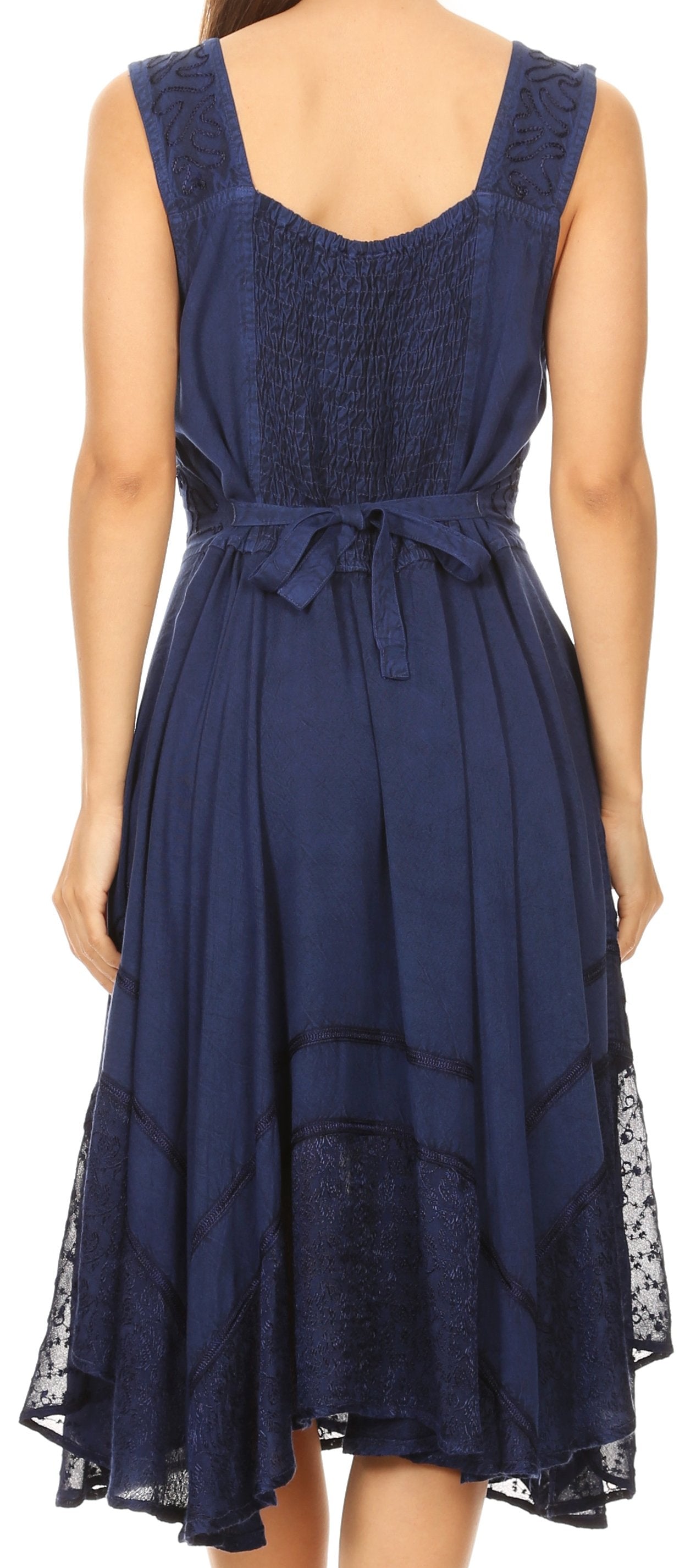 Navy blue dress with lace detailing on a white background