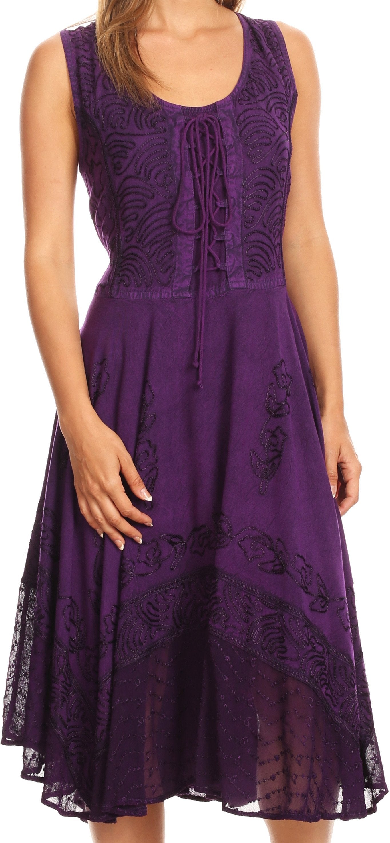 Purple lace dress worn by a model on a plain background