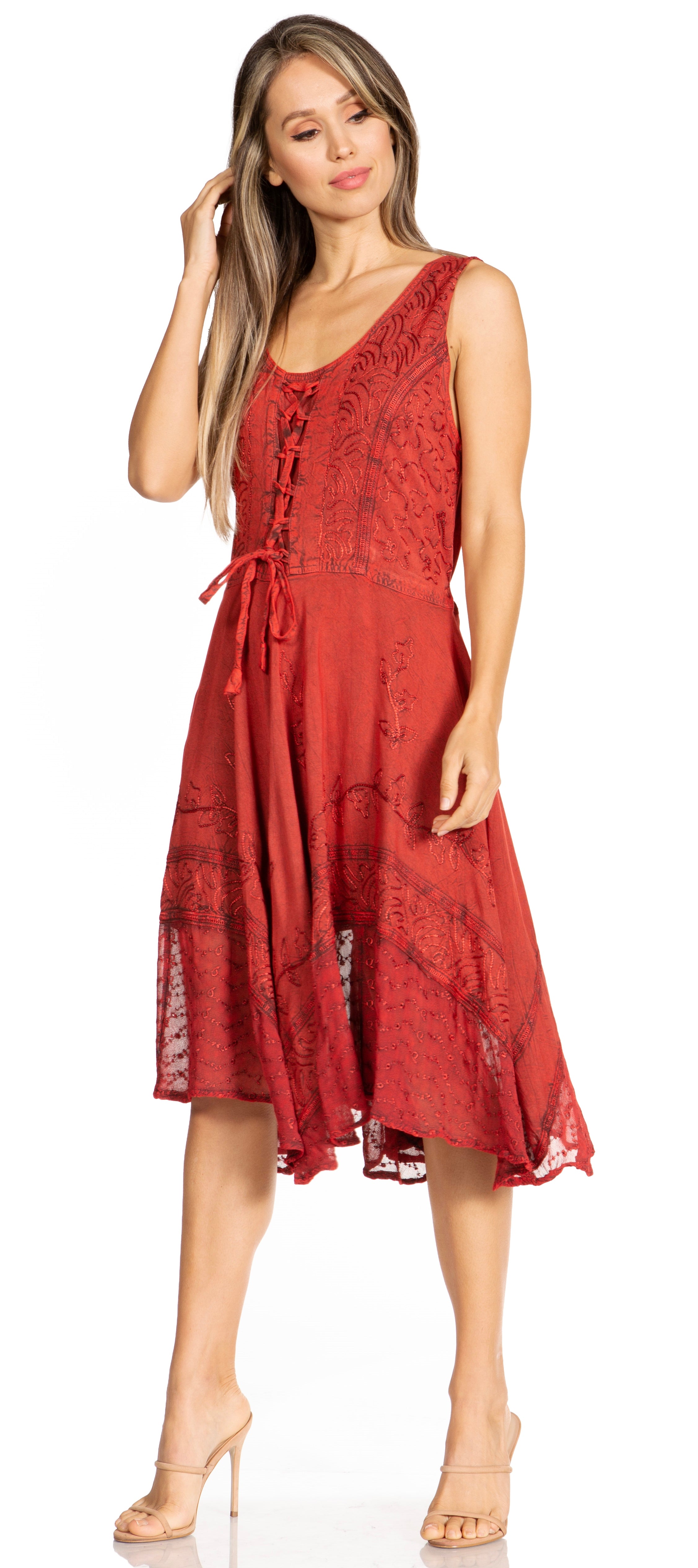 Woman wearing a red dress with lace details on a white background