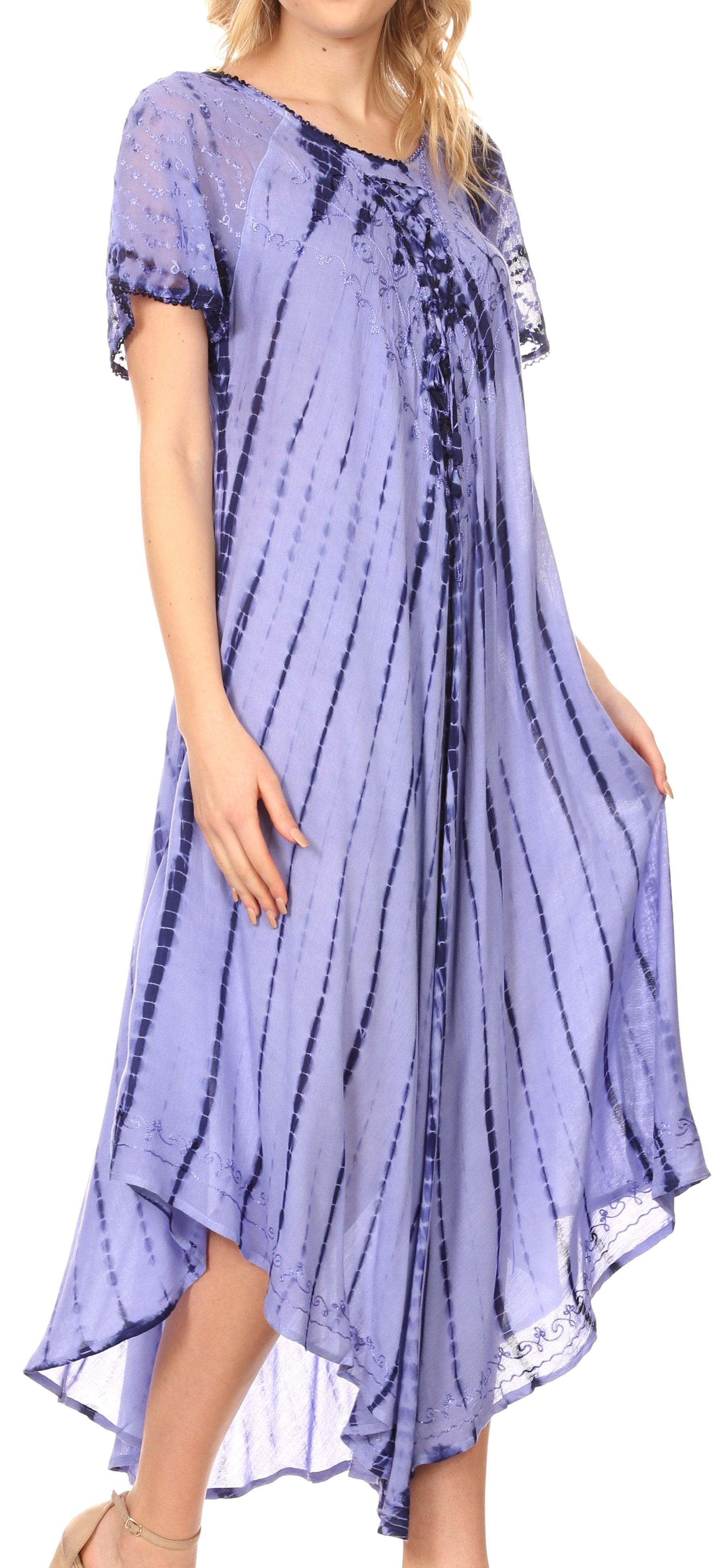 Woman wearing a purple tie-dye dress with lace trim