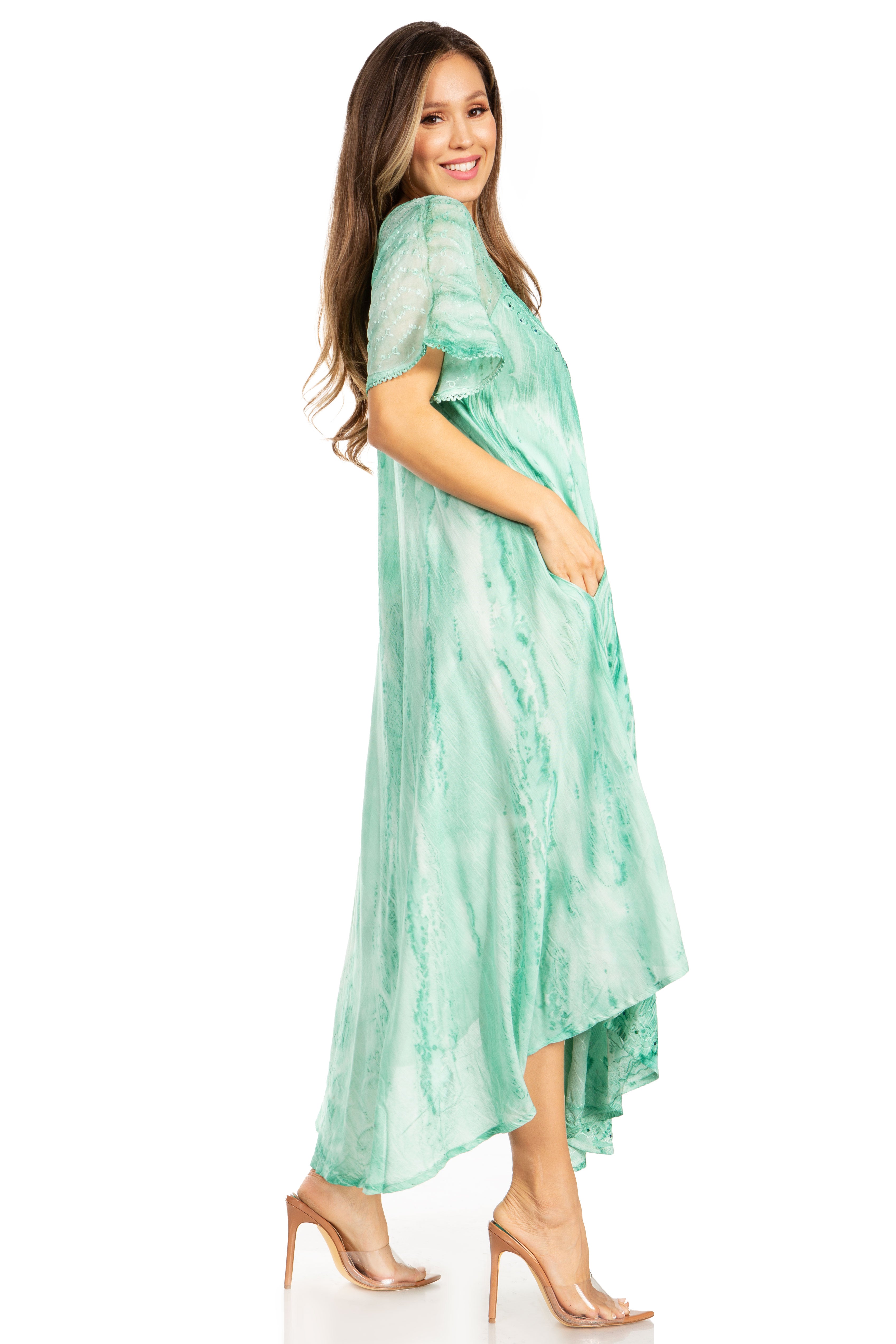 Woman wearing a green dress on a white background