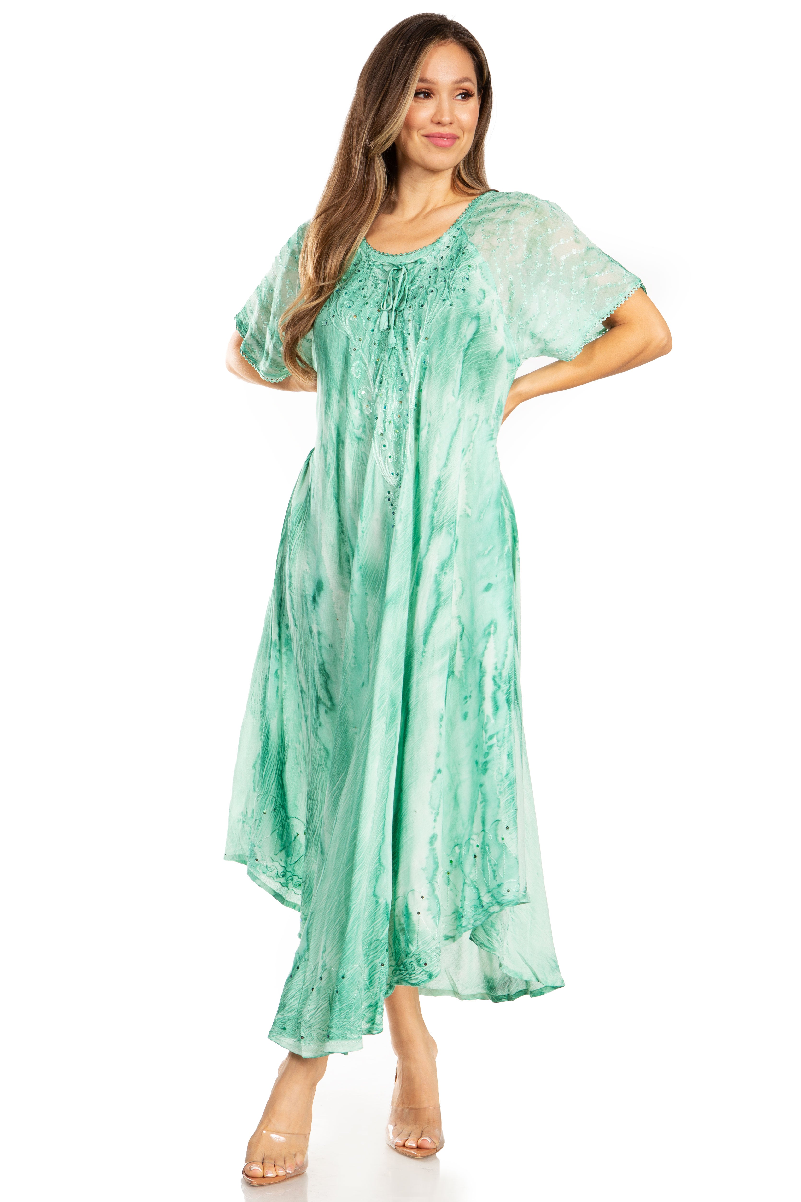 Woman wearing a green dress on a white background