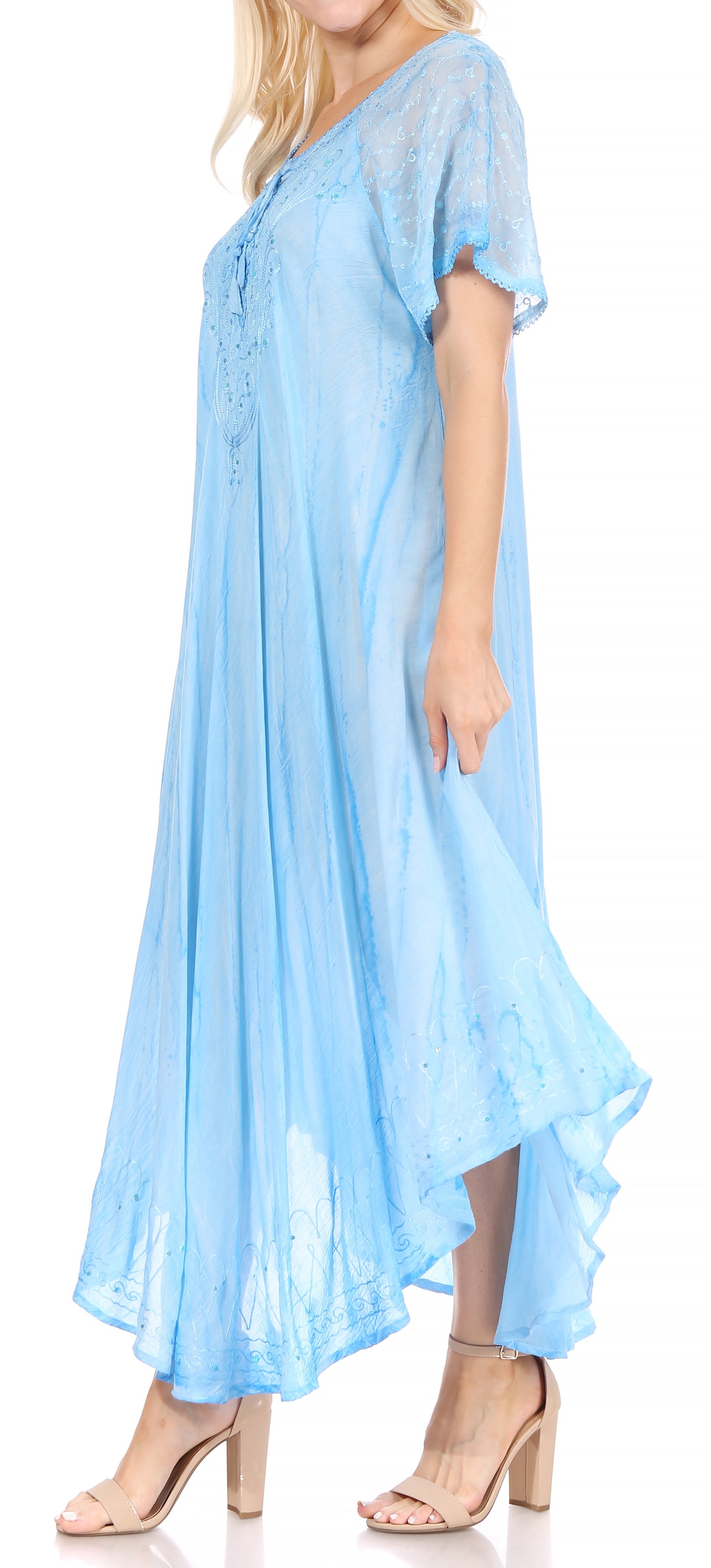 Light blue dress worn by a model on a white background