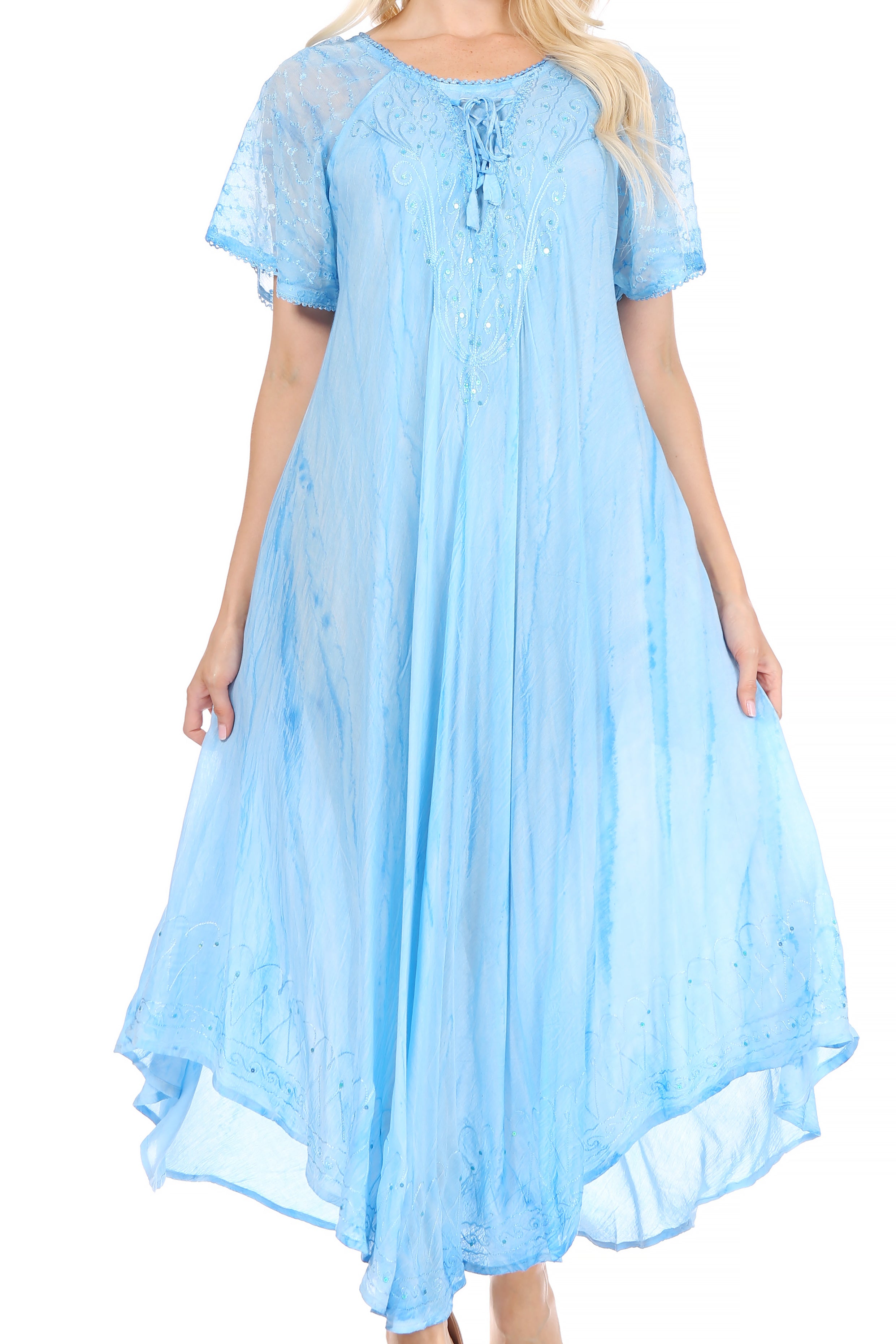 Woman wearing a light blue dress with a white background