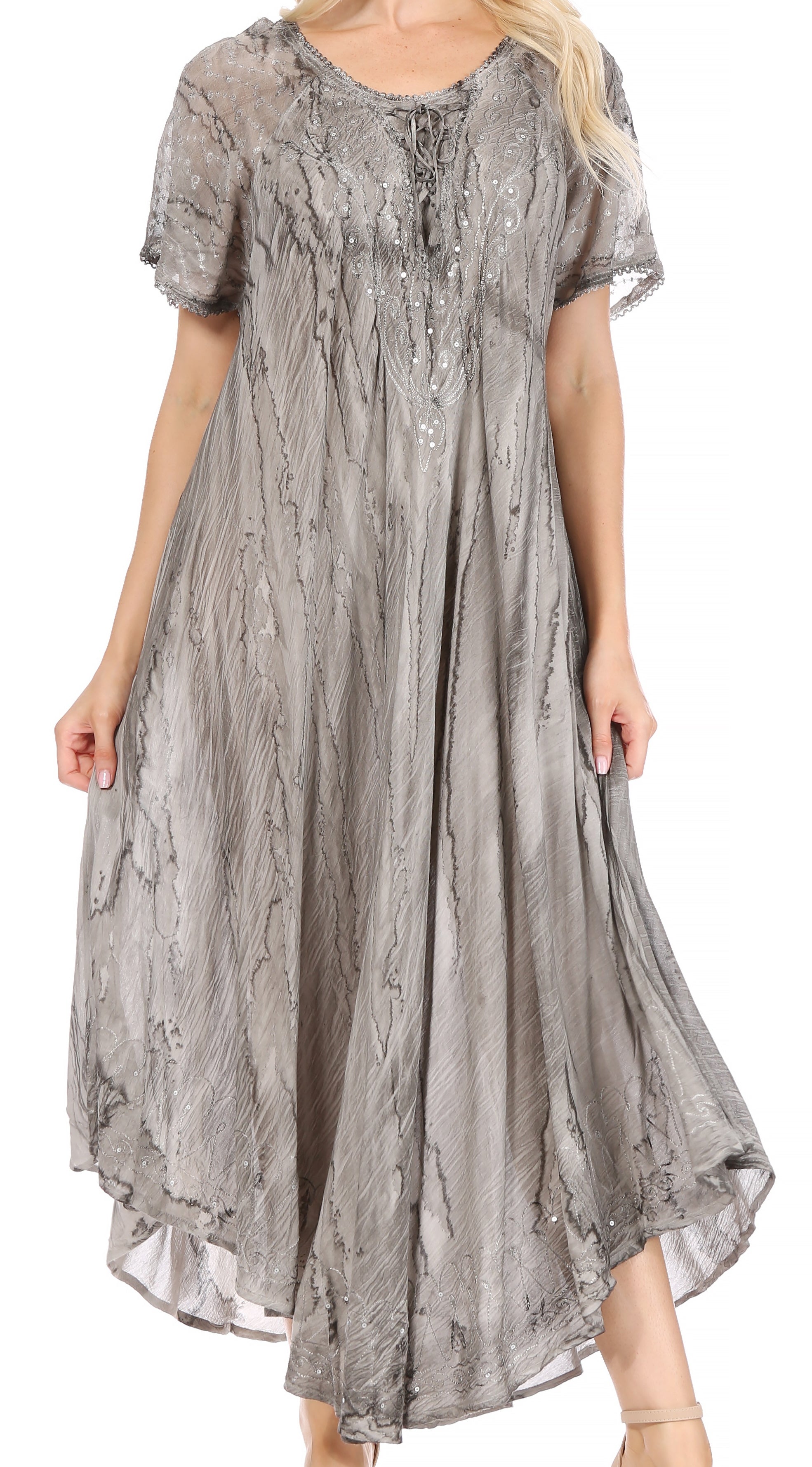 Long, patterned dress with short sleeves on a white background