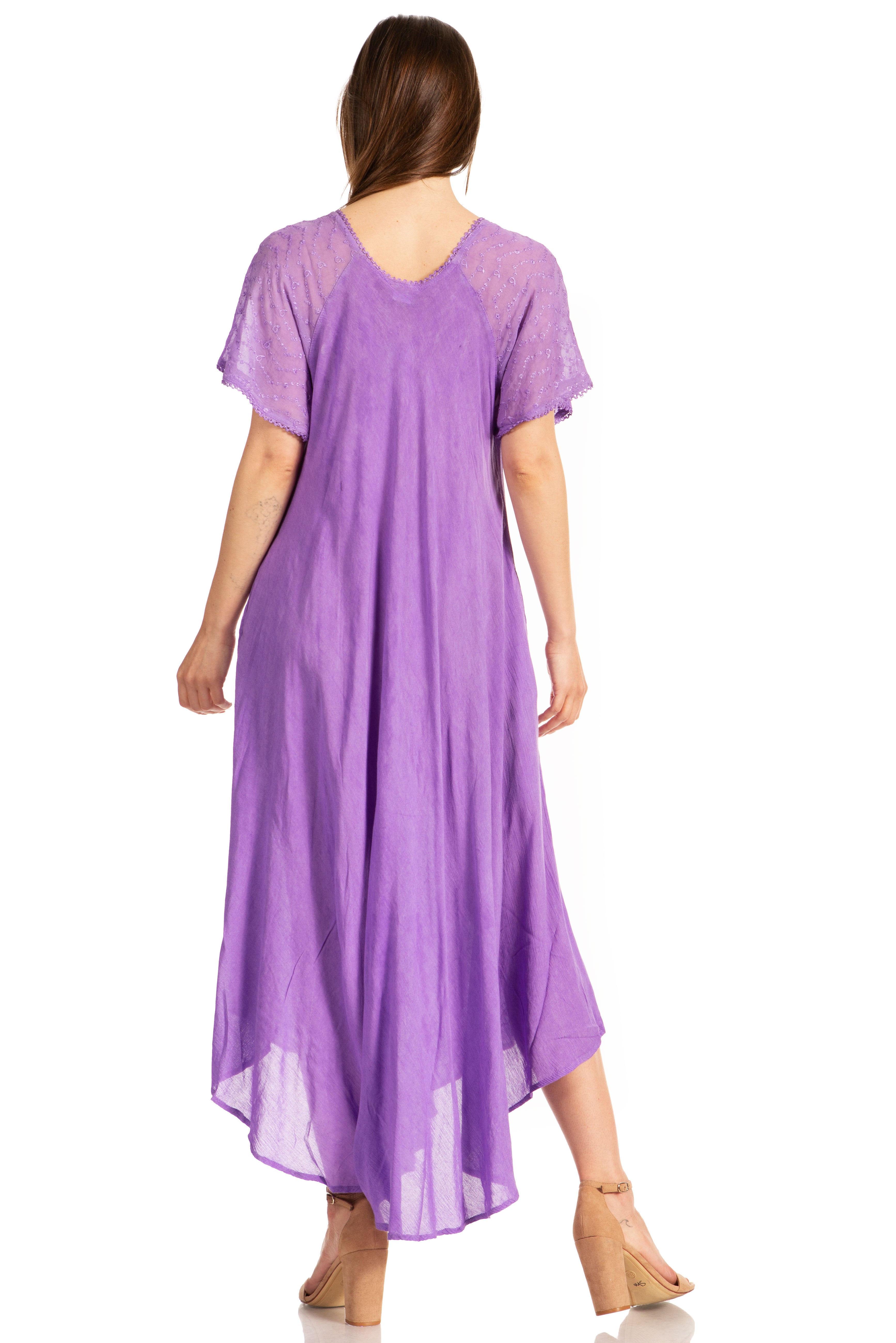 Woman wearing a purple dress from behind on a white background