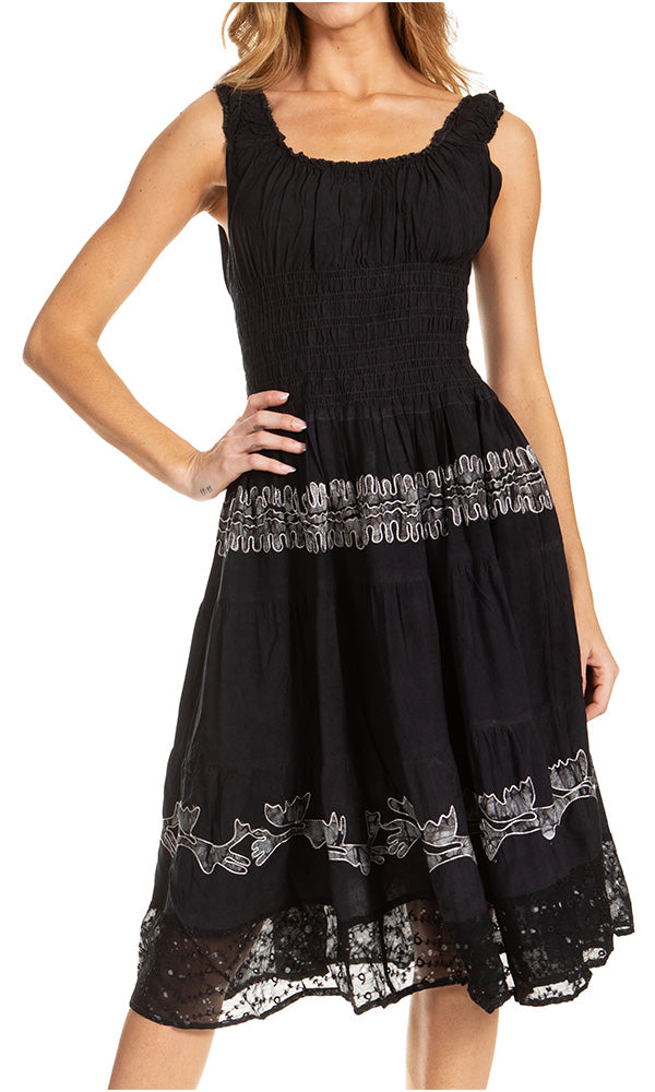 Black dress with lace details on a white background