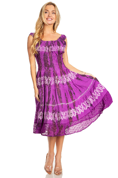 Woman wearing a purple dress with white lace details on a white background