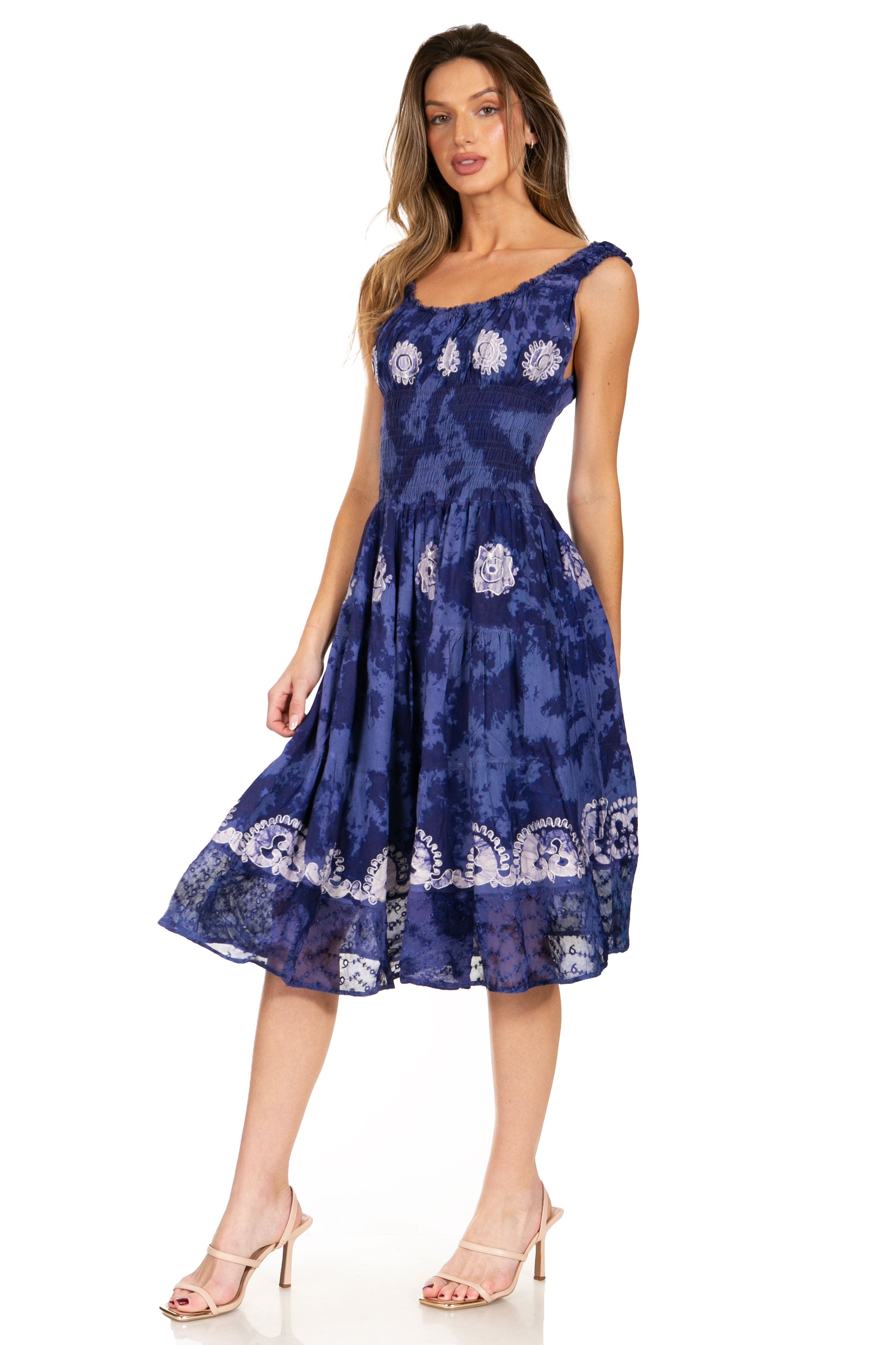 Woman wearing a blue floral dress on a white background