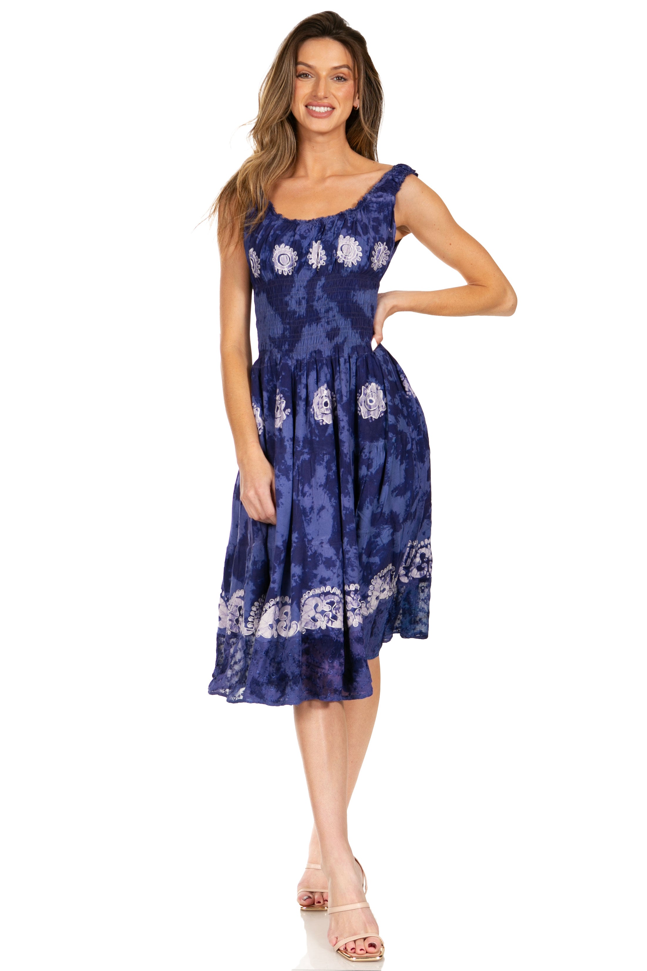 Woman wearing a blue floral dress on a white background
