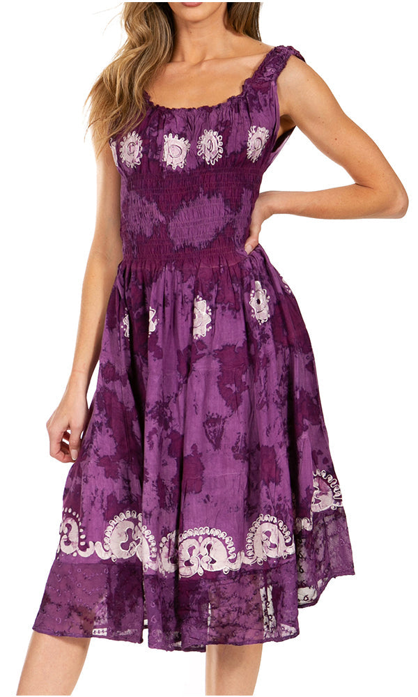 Woman wearing a purple floral dress on a white background
