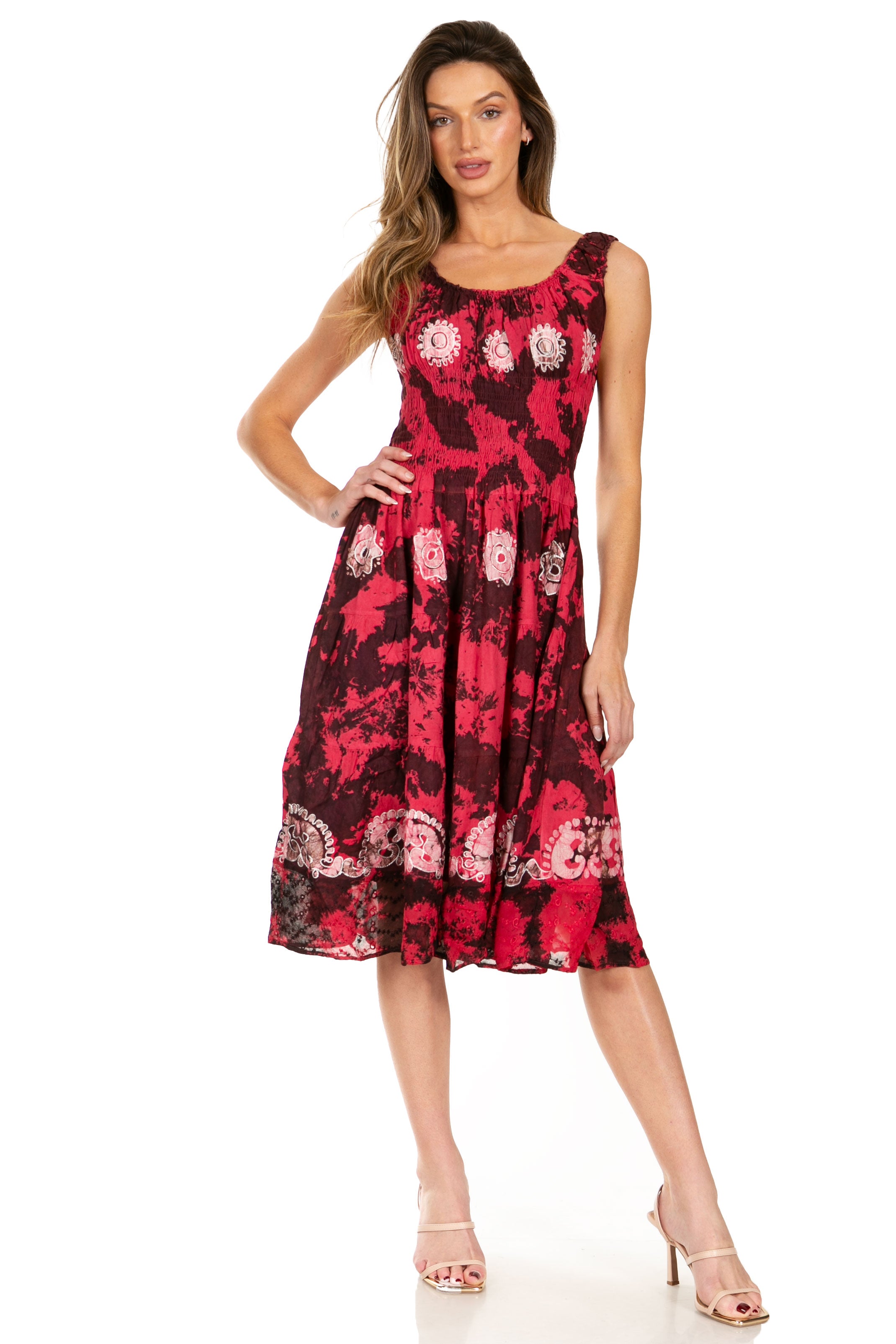 Woman wearing a red floral dress on a white background