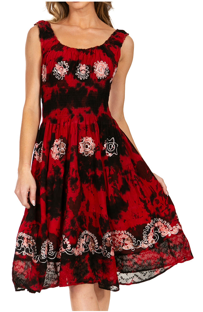 Red and black patterned dress with floral designs on a white background
