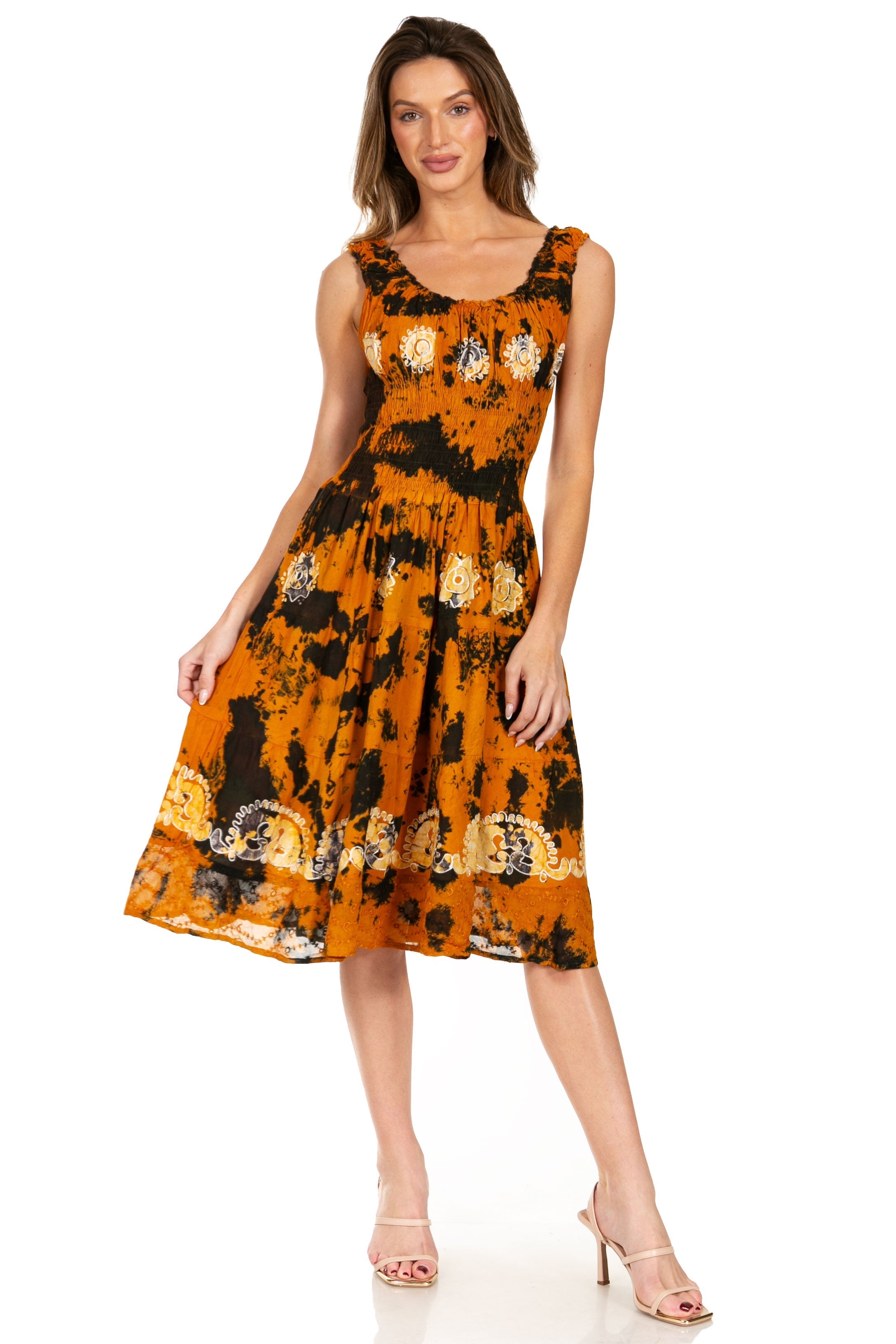 Woman wearing a sleeveless dress with floral pattern on a white background