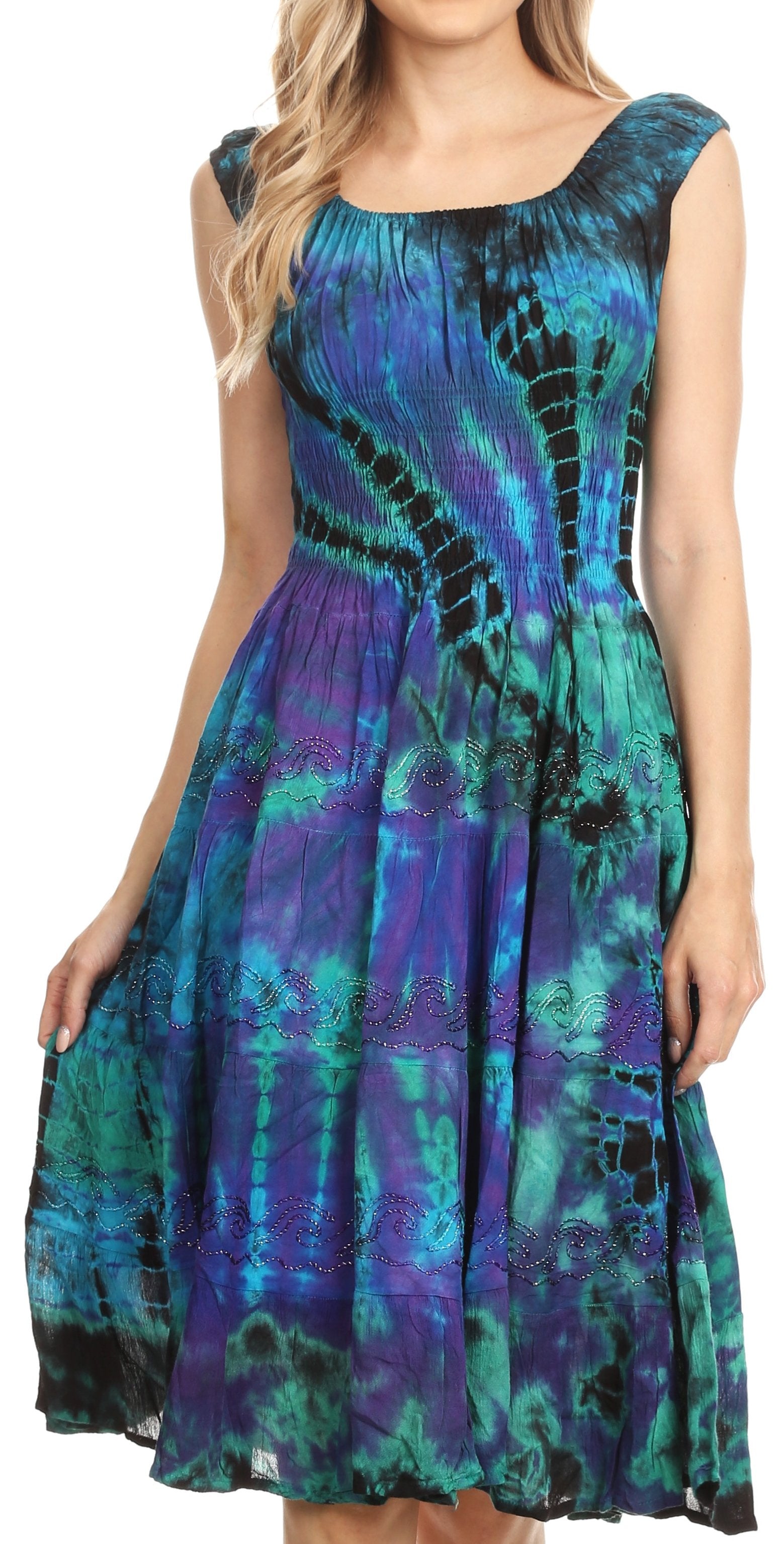 Woman wearing a colorful tie-dye dress on a white background