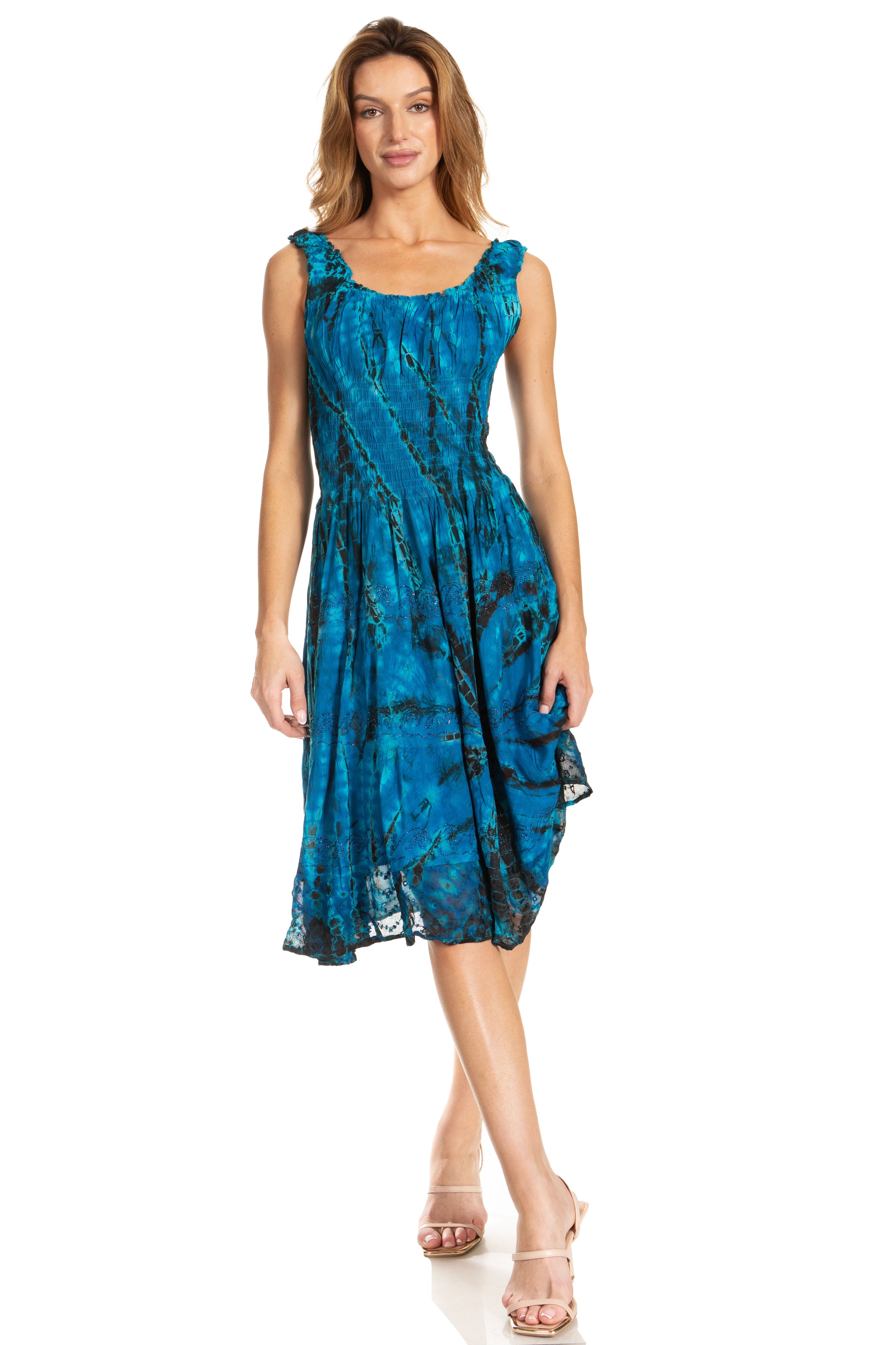 Woman wearing a blue patterned dress on a white background